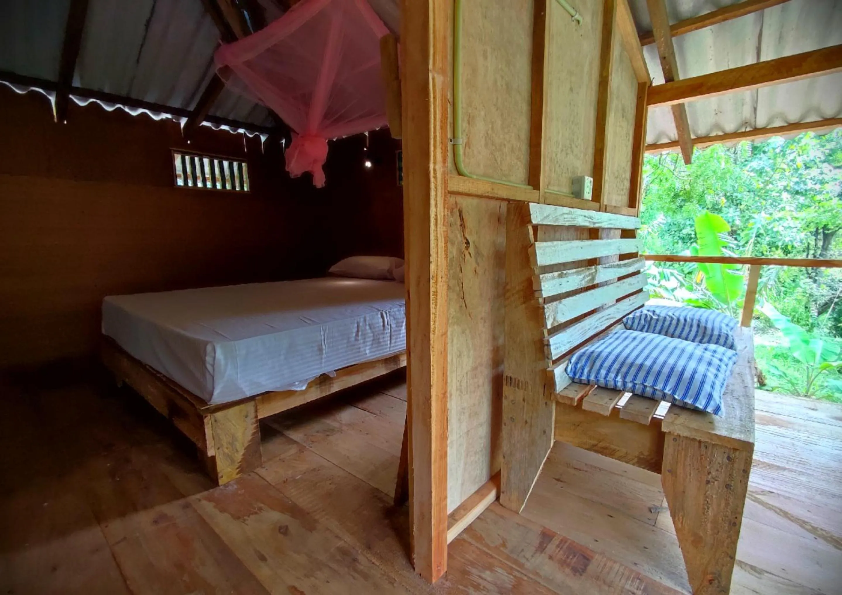 Bed in Sigiriya River Side Villa