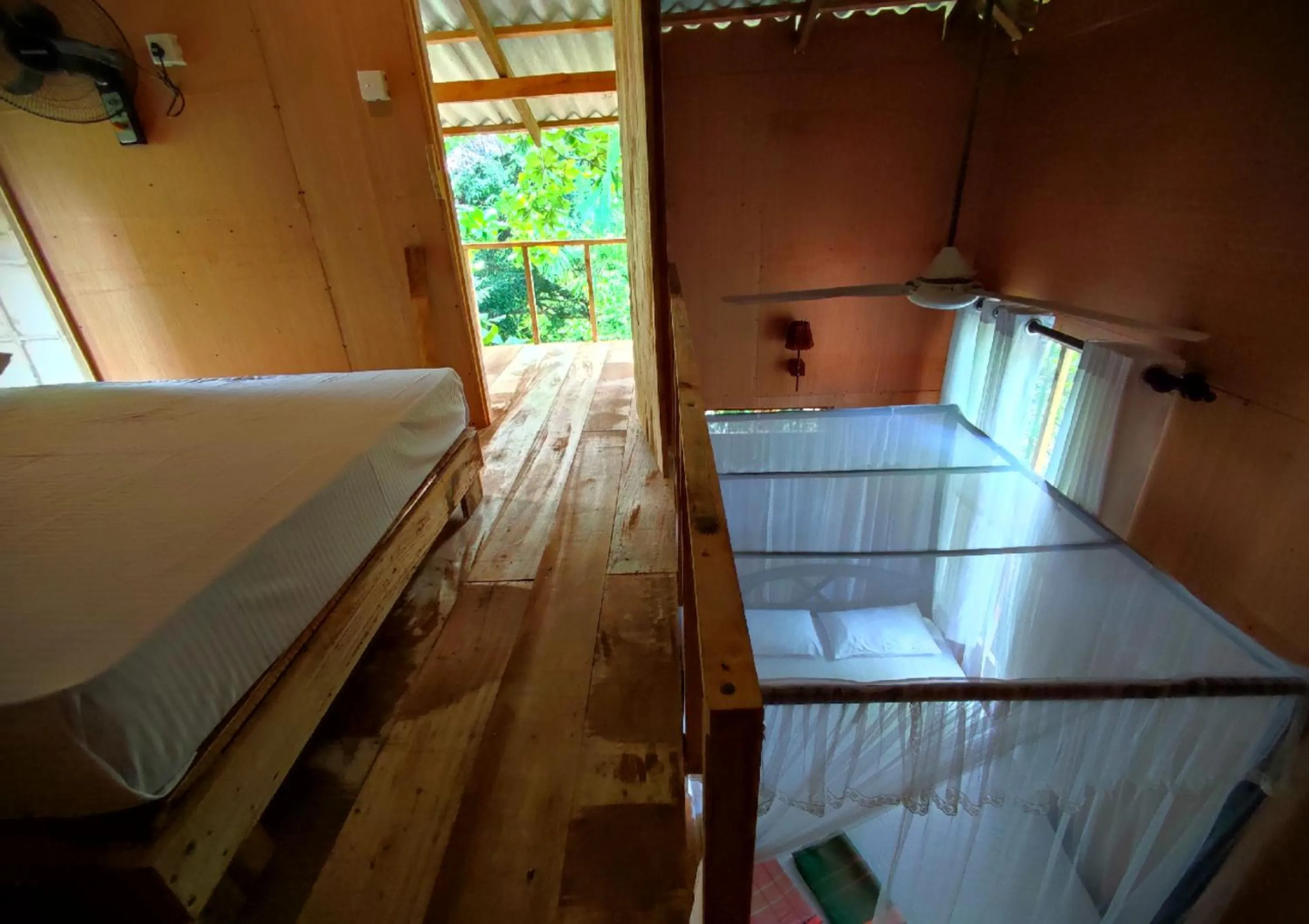 Bed in Sigiriya River Side Villa