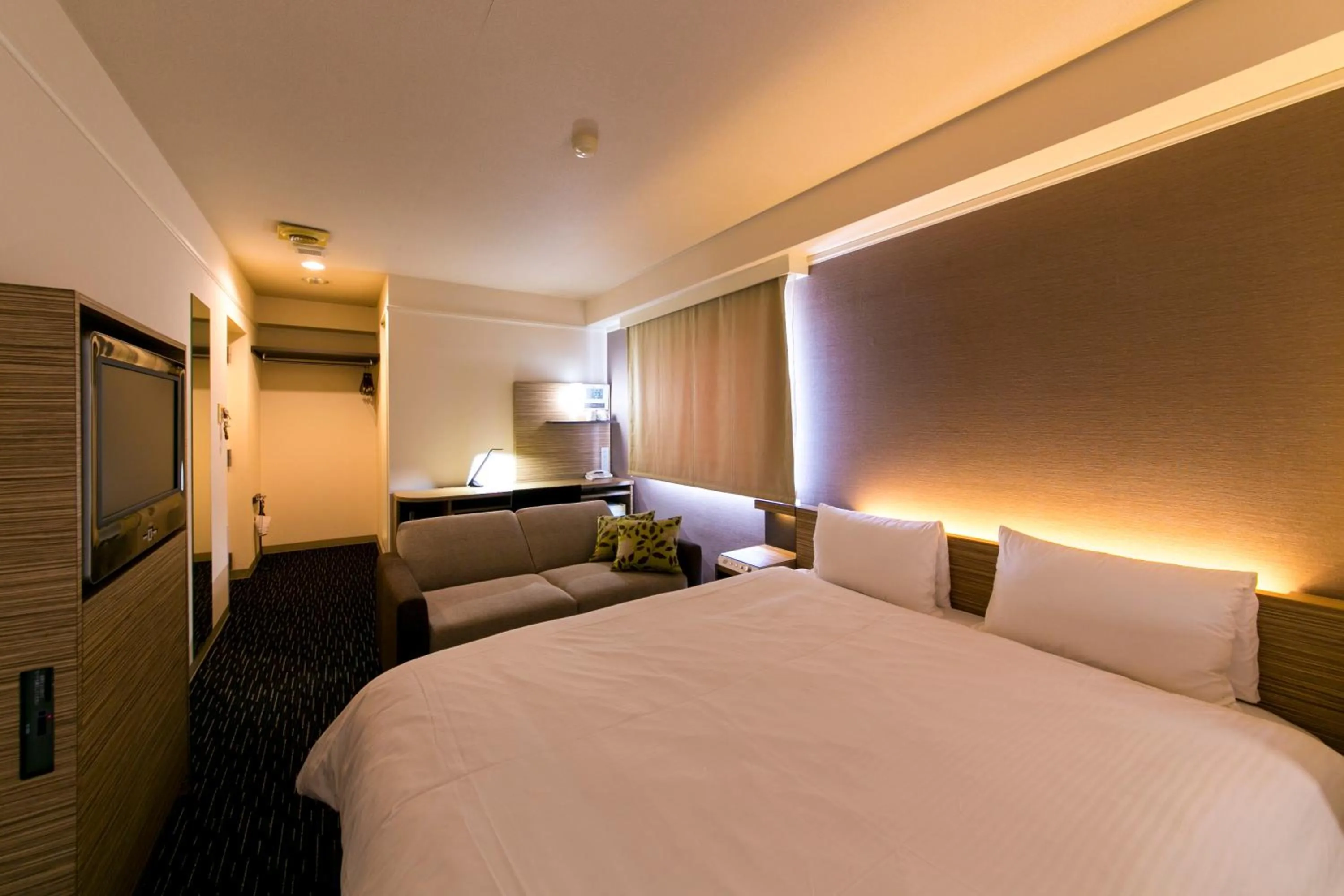 Bed in Plaza Hotel Toyota