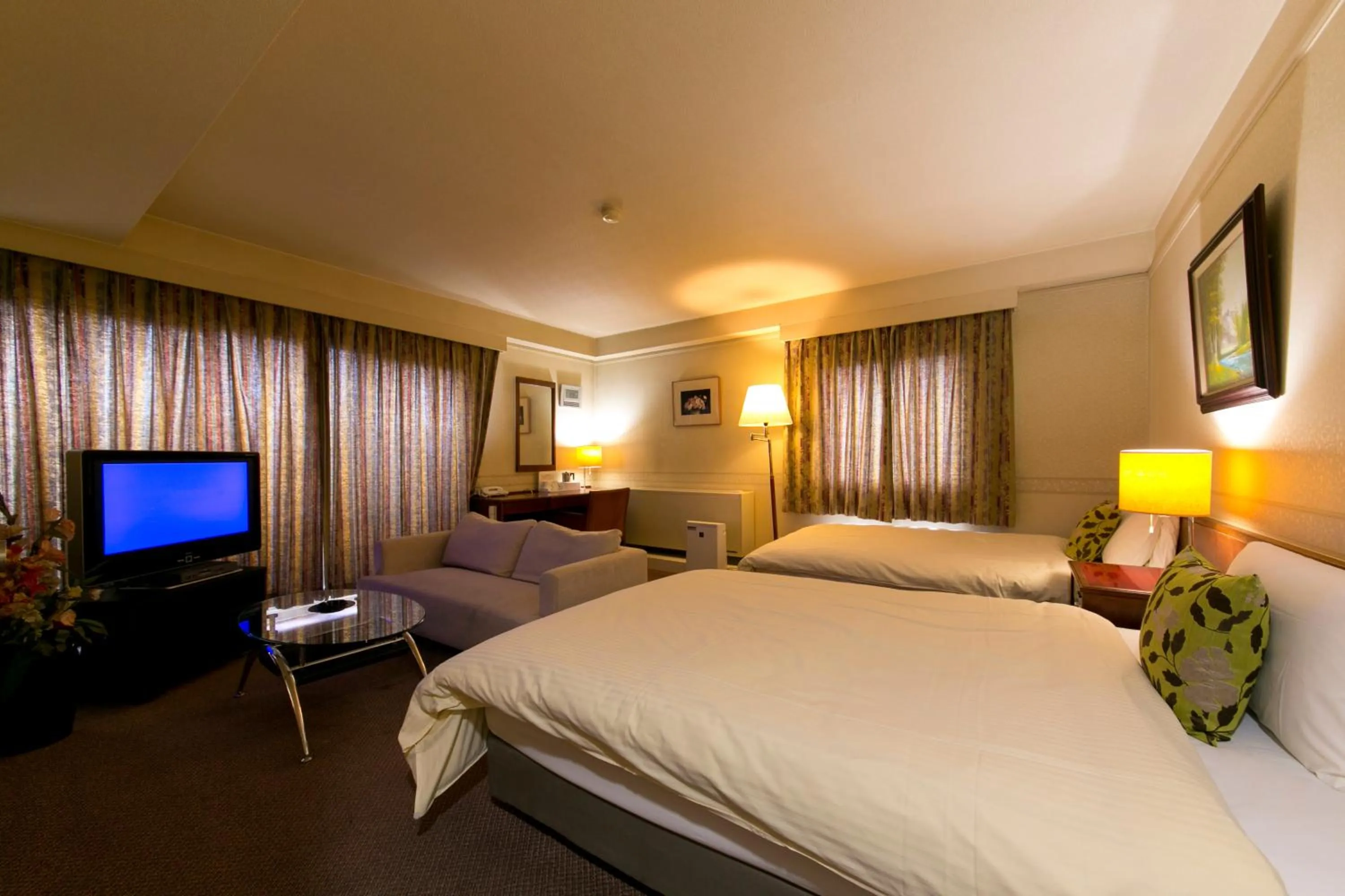 Bed in Plaza Hotel Toyota