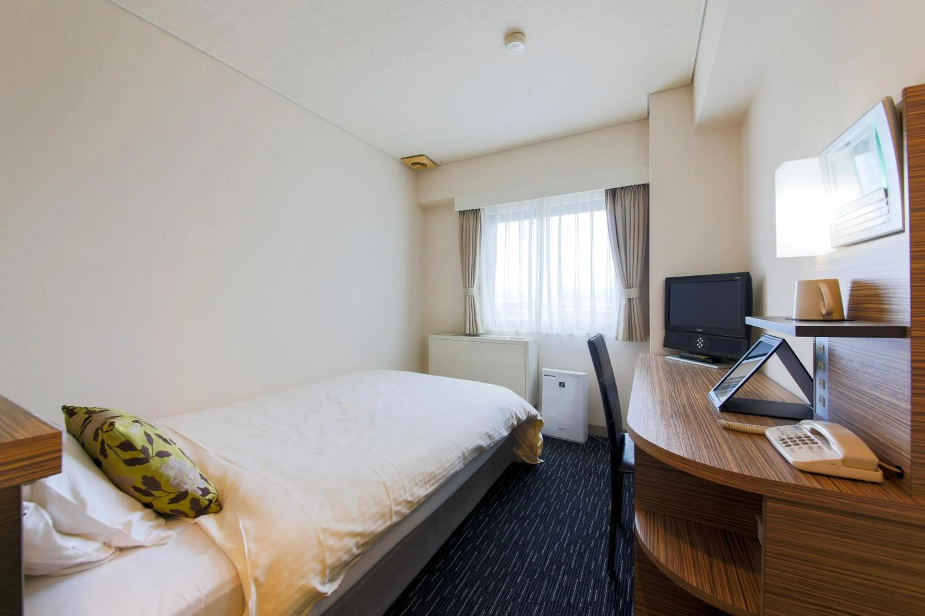 Photo of the whole room, Bed in Plaza Hotel Toyota