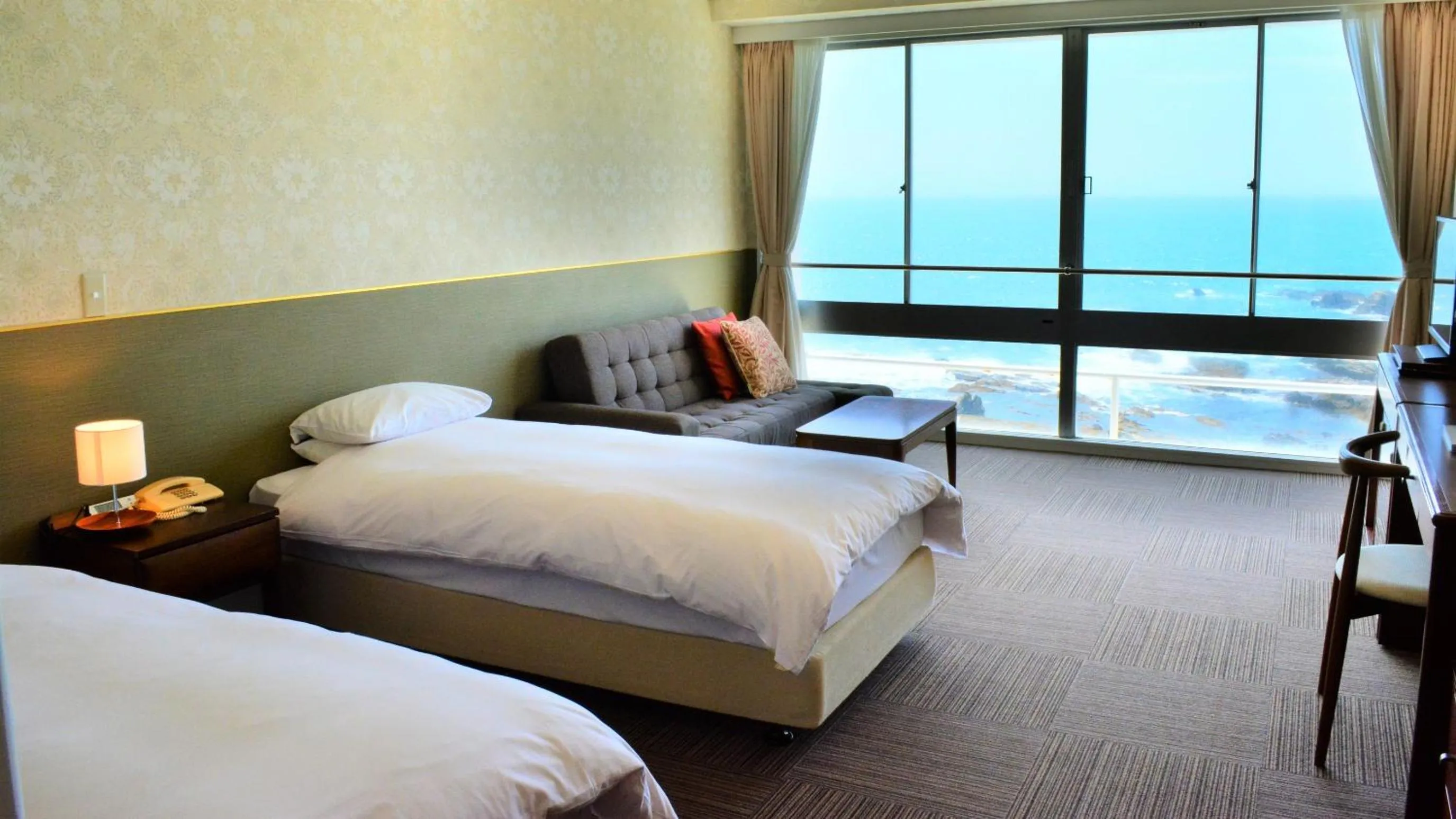 Bed in Shiosai Resort Kamogawa