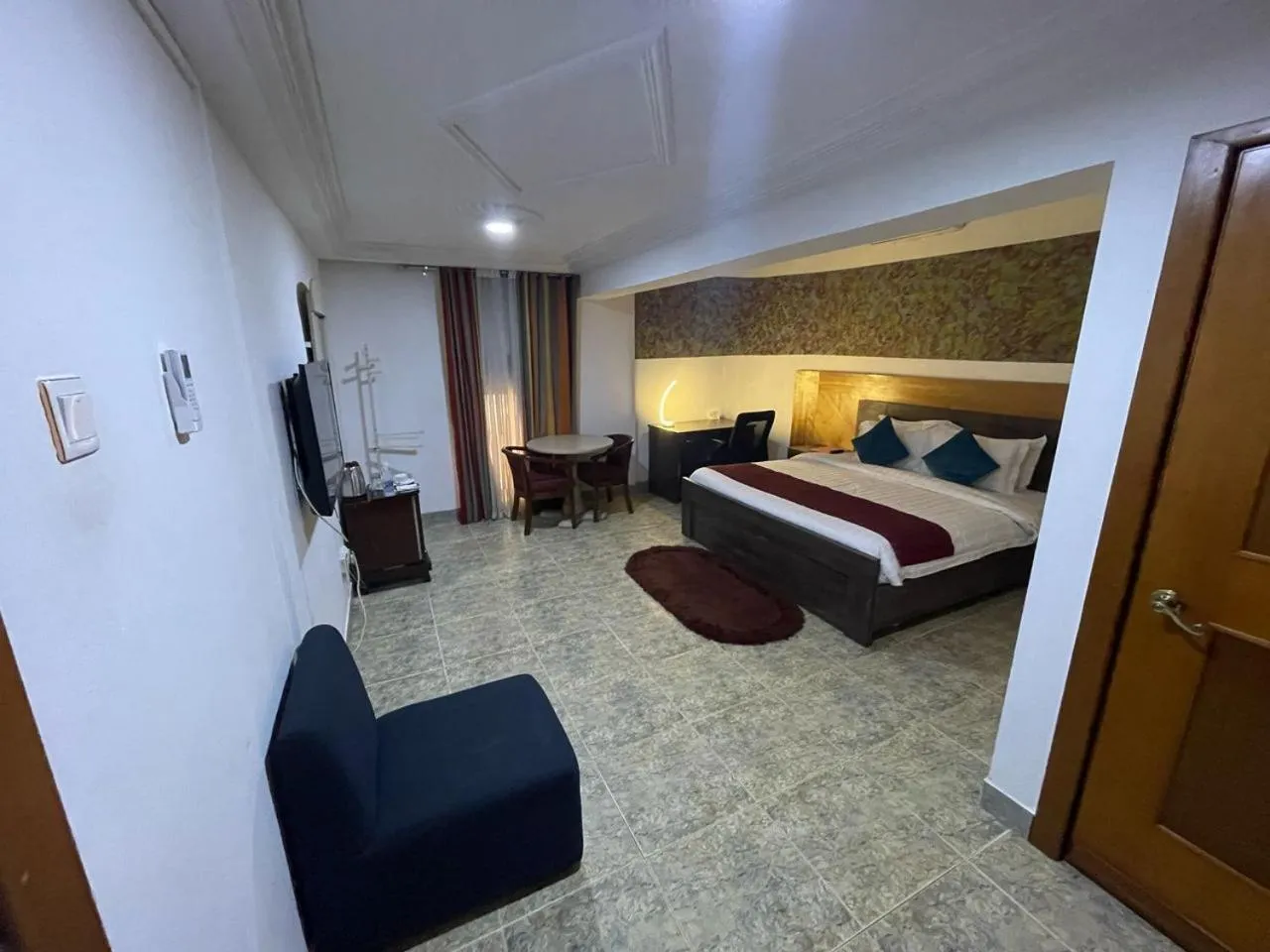 Bed in Sam's Cottage Hotel