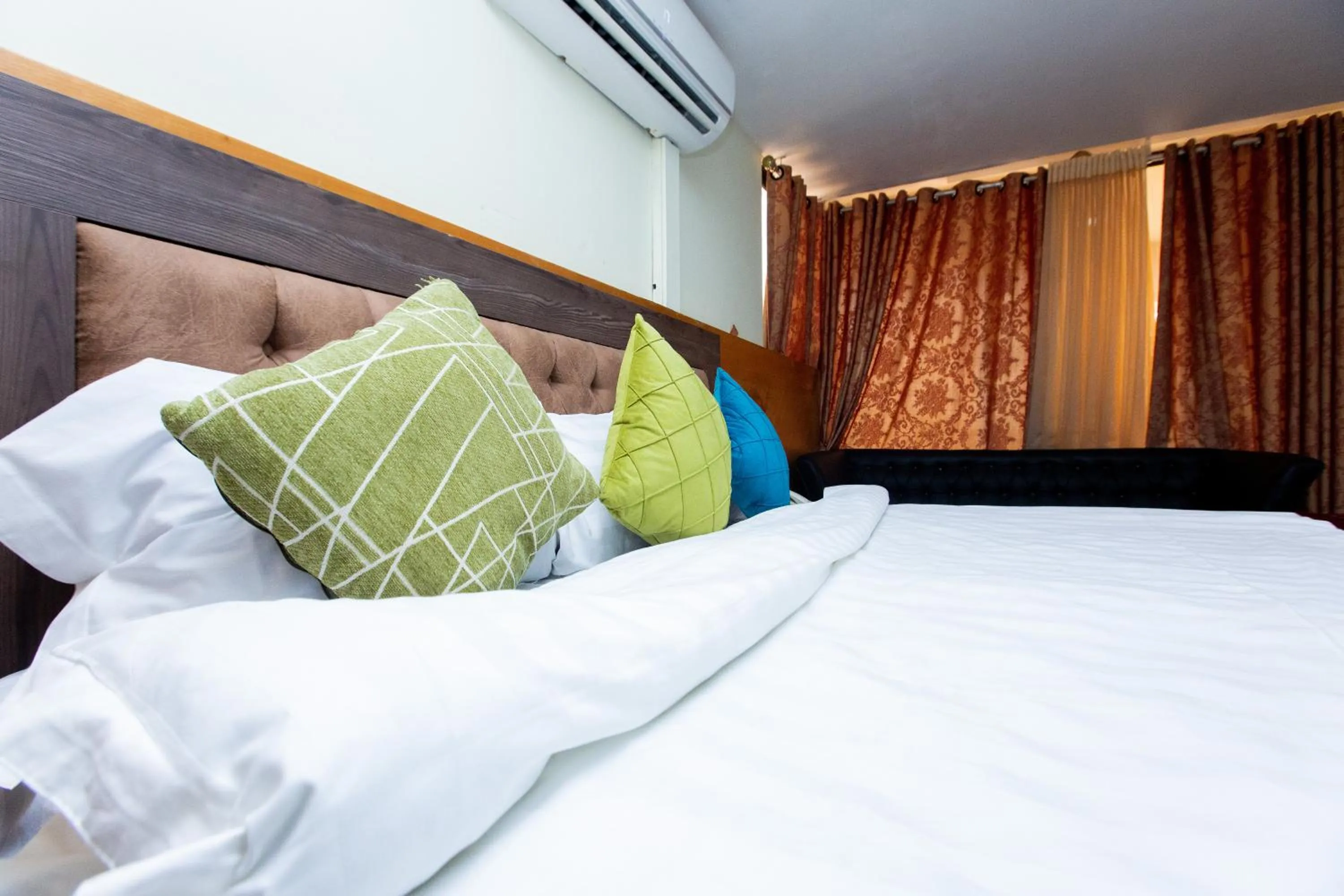 Bedroom, Bed in Sam's Cottage Hotel