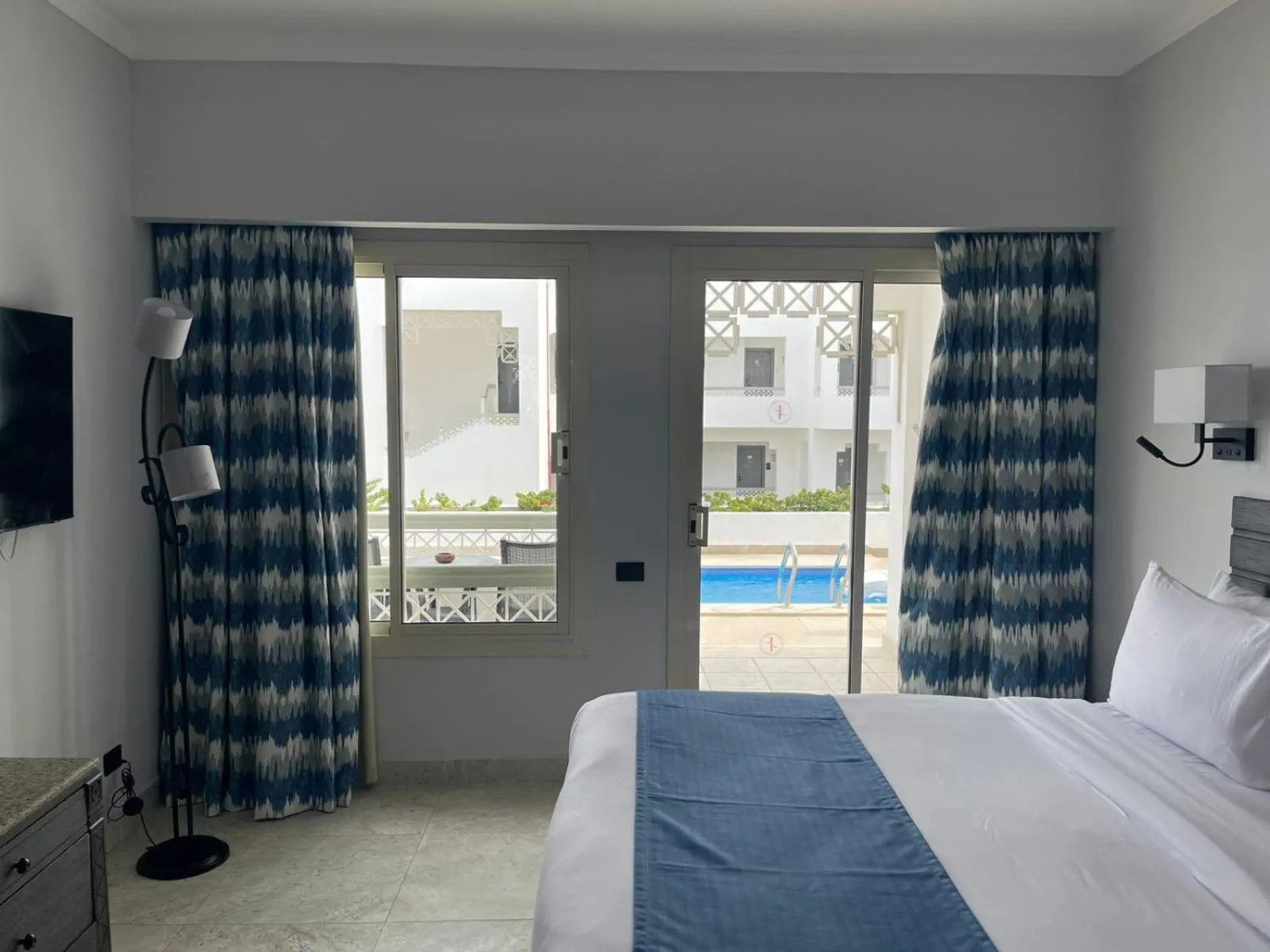 Bedroom, Bed in Invidia Coral Beach Tiran