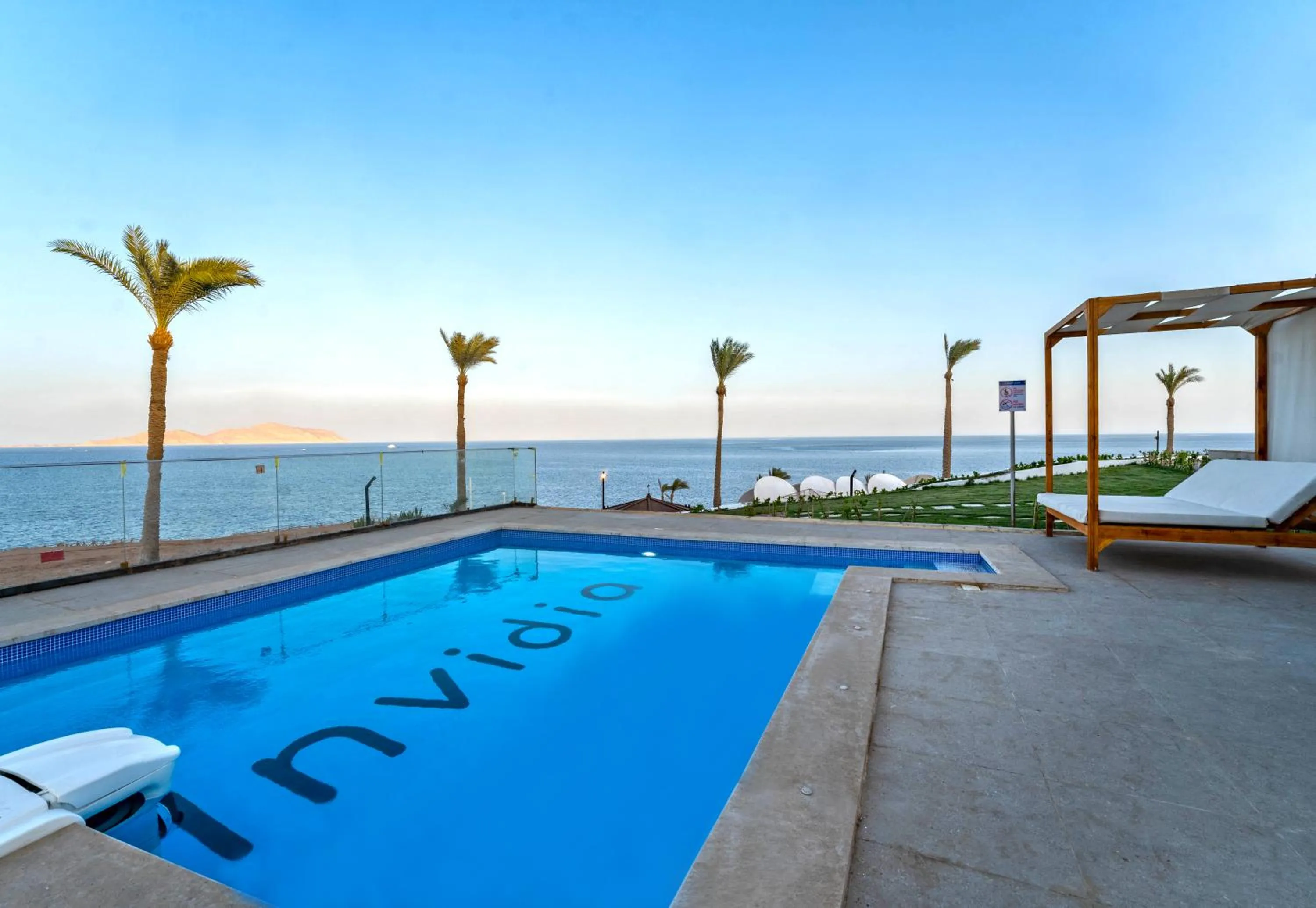 Swimming pool in Invidia Coral Beach Tiran