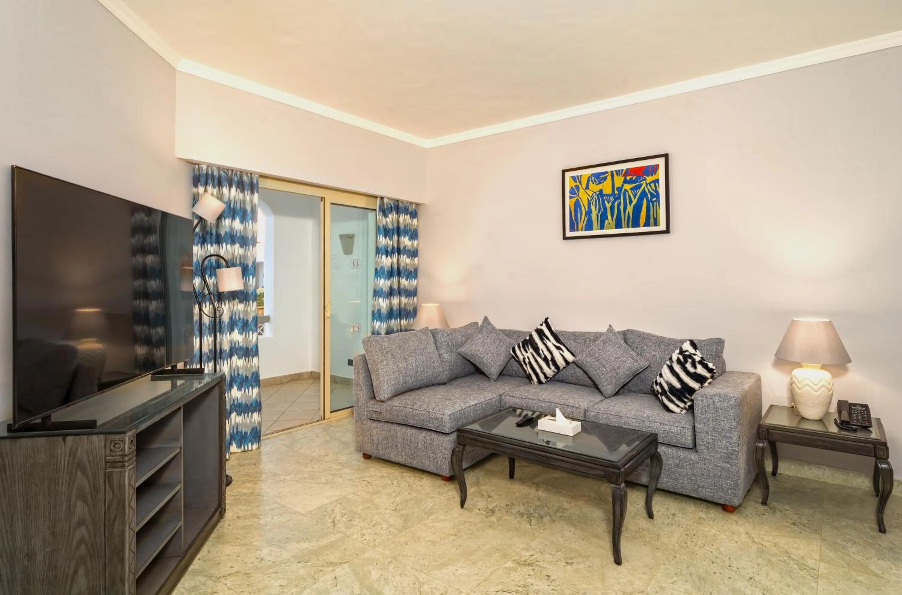 Living room in Invidia Coral Beach Tiran