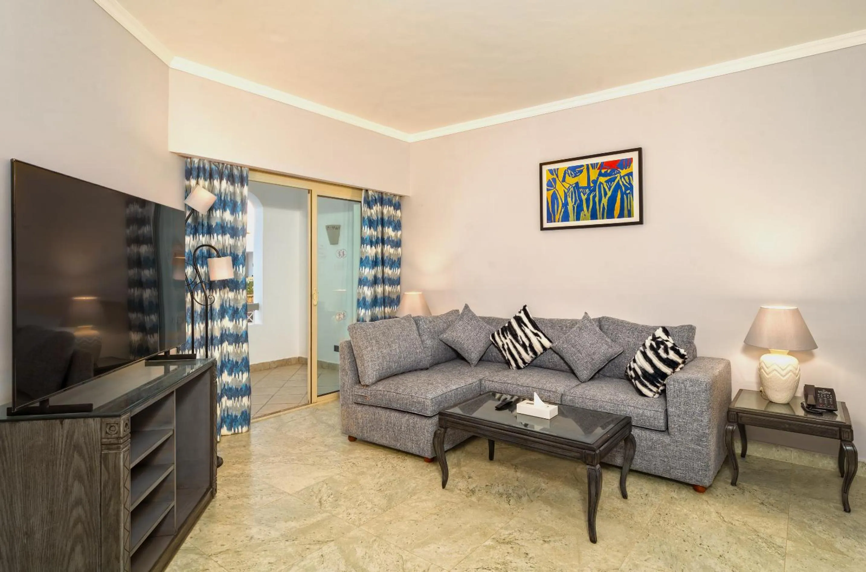 Living room in Invidia Coral Beach Tiran