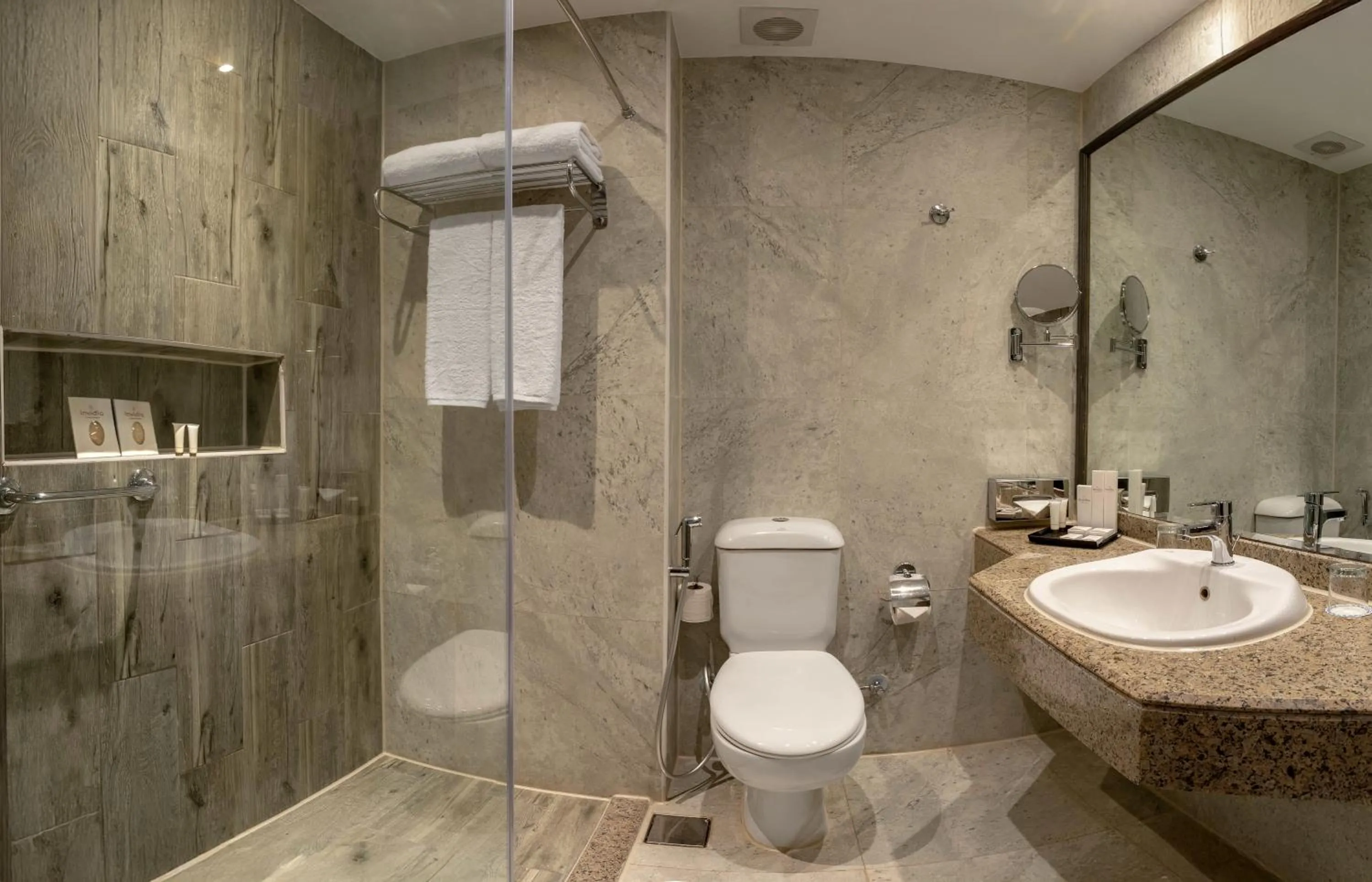 Bathroom in Invidia Coral Beach Tiran