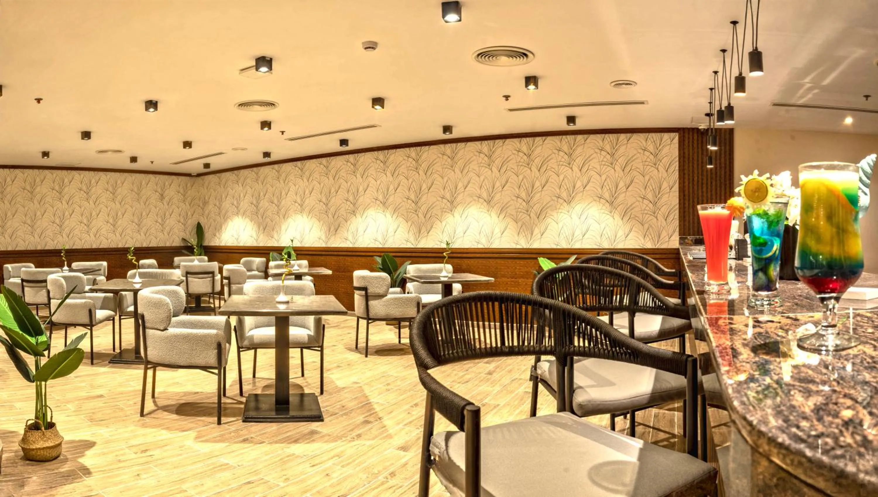 Lounge or bar in Invidia Coral Beach Tiran