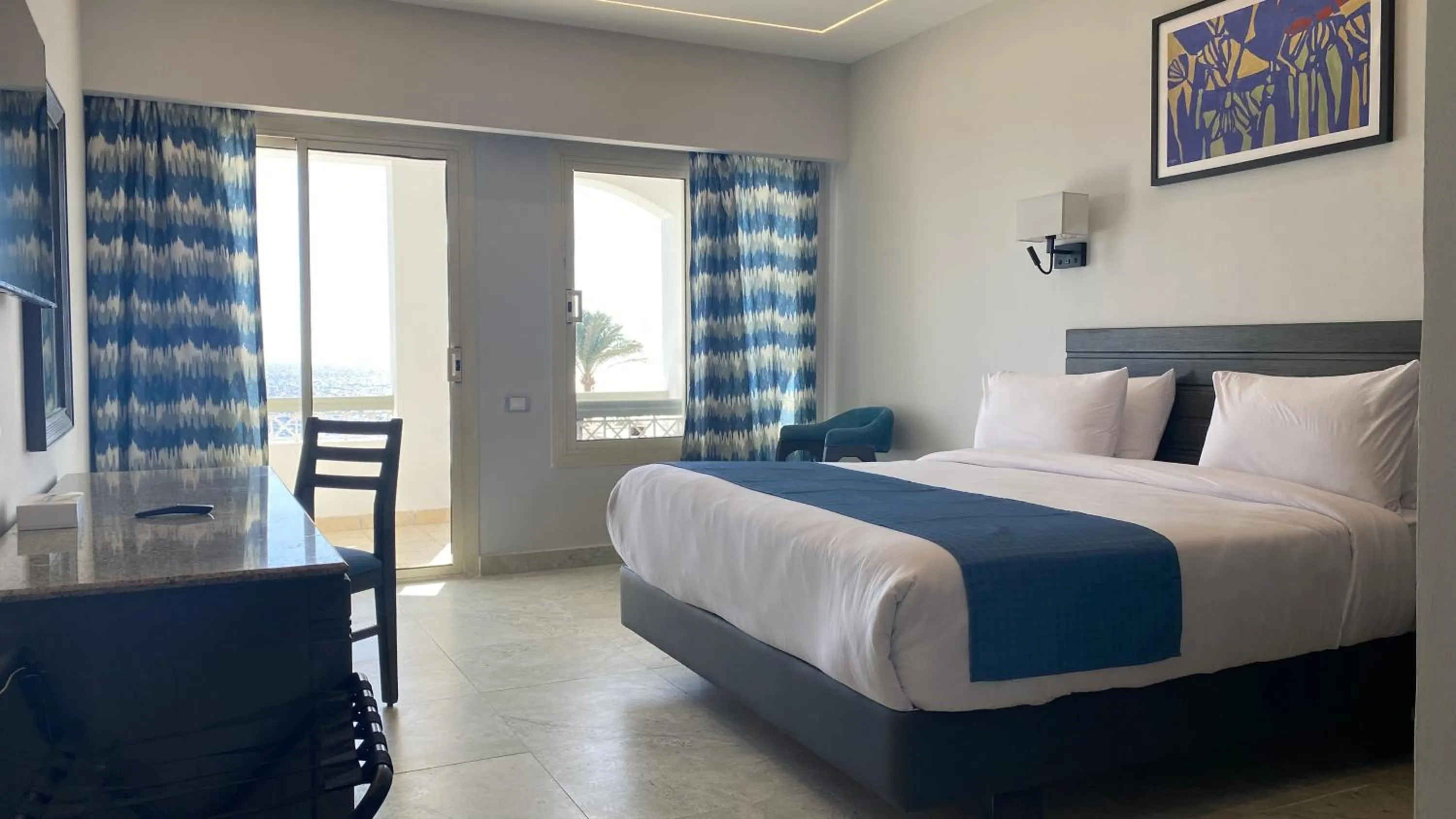 Bedroom, Bed in Invidia Coral Beach Tiran
