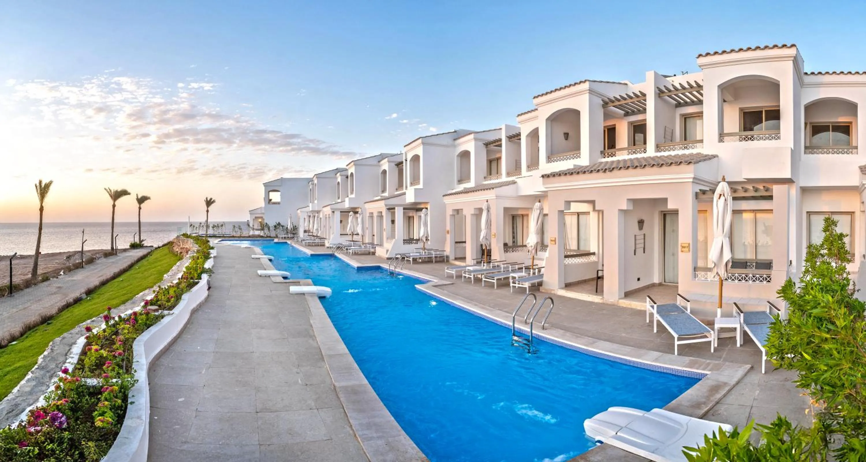 Pool view in Invidia Coral Beach Tiran