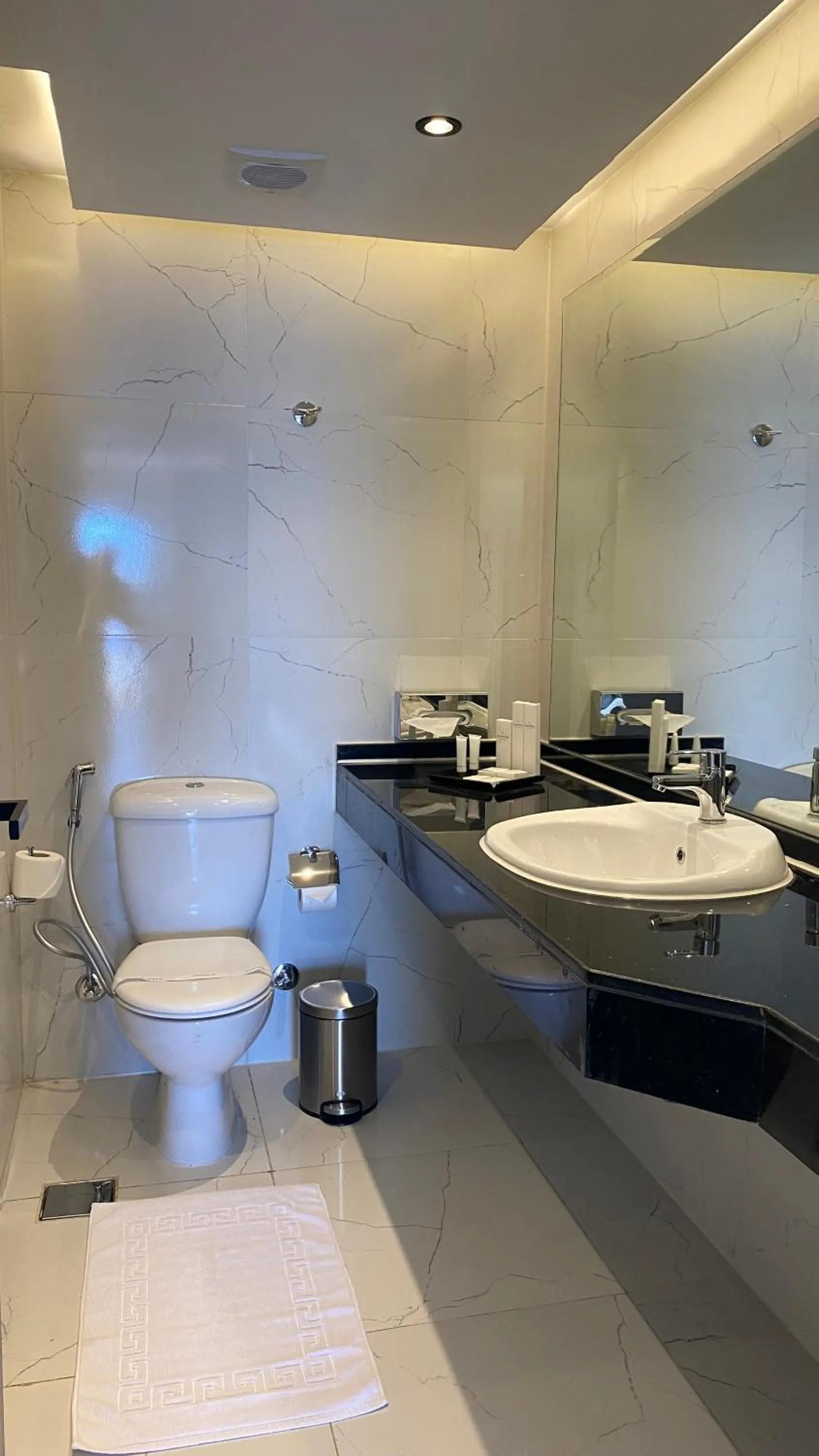 Bathroom in Invidia Coral Beach Tiran