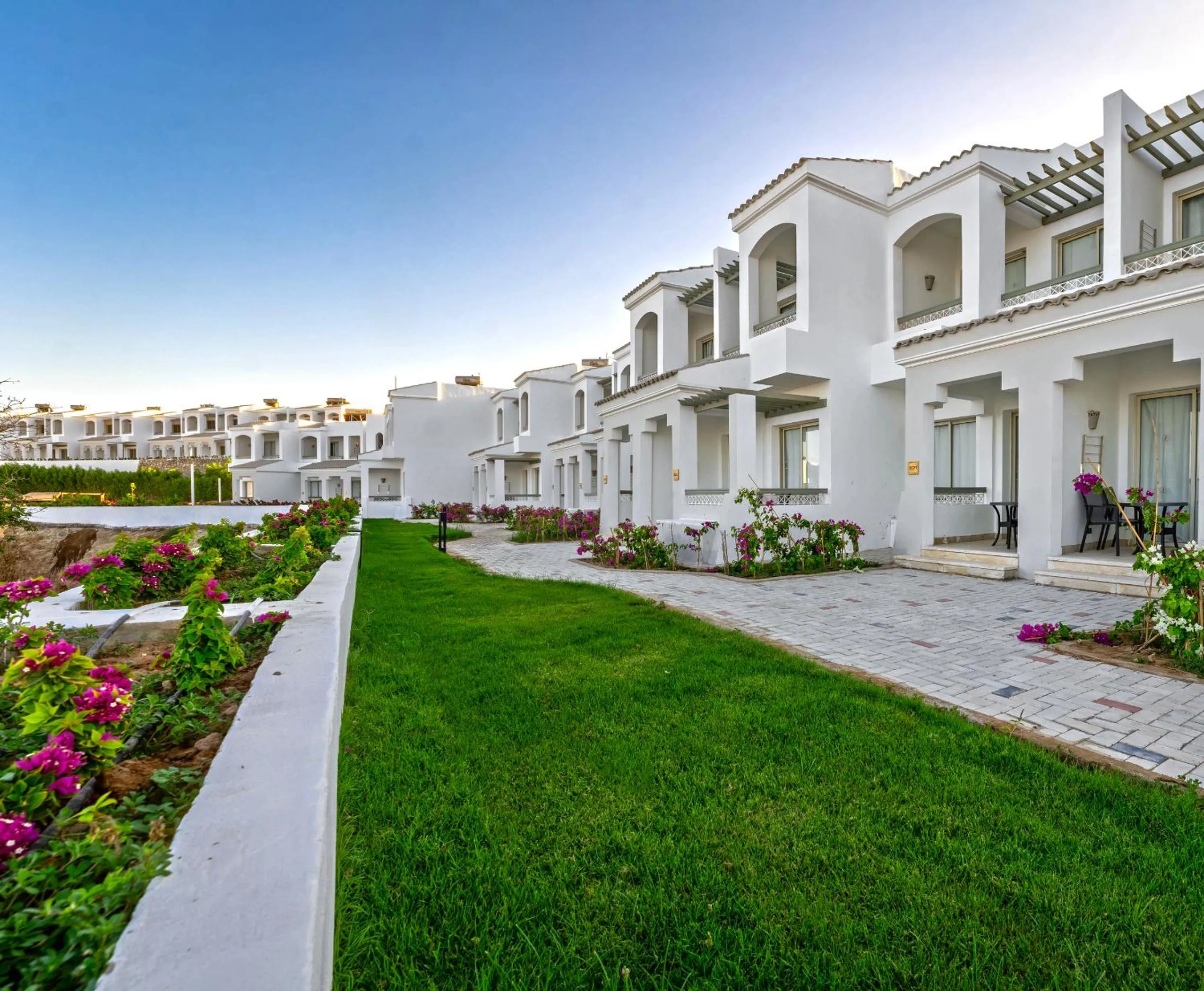 Garden view in Invidia Coral Beach Tiran