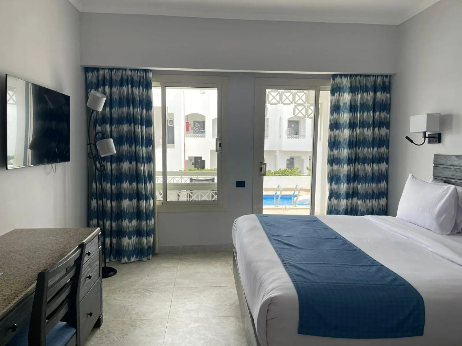 Bedroom, Bed in Invidia Coral Beach Tiran