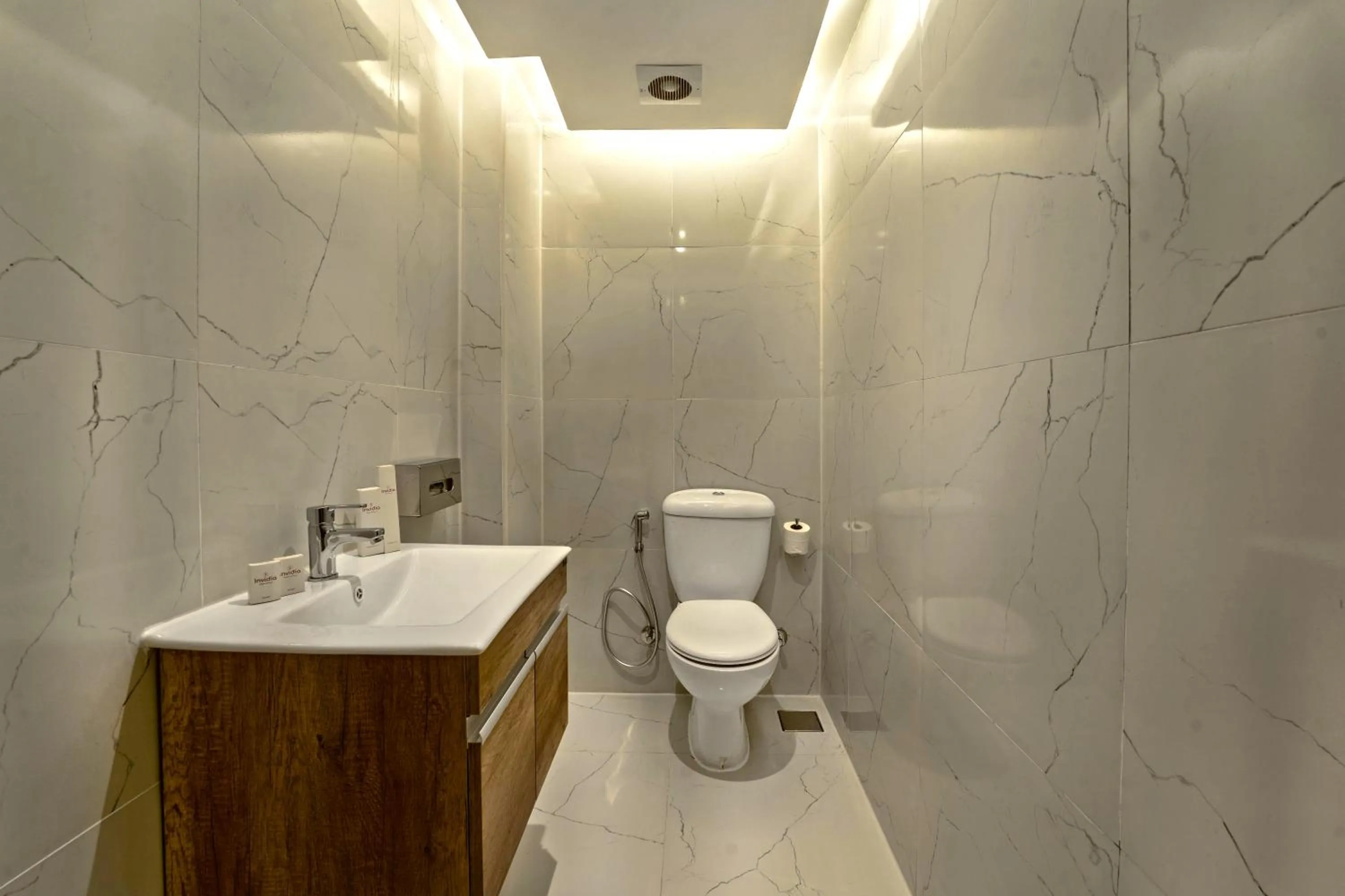 Bathroom in Invidia Coral Beach Tiran