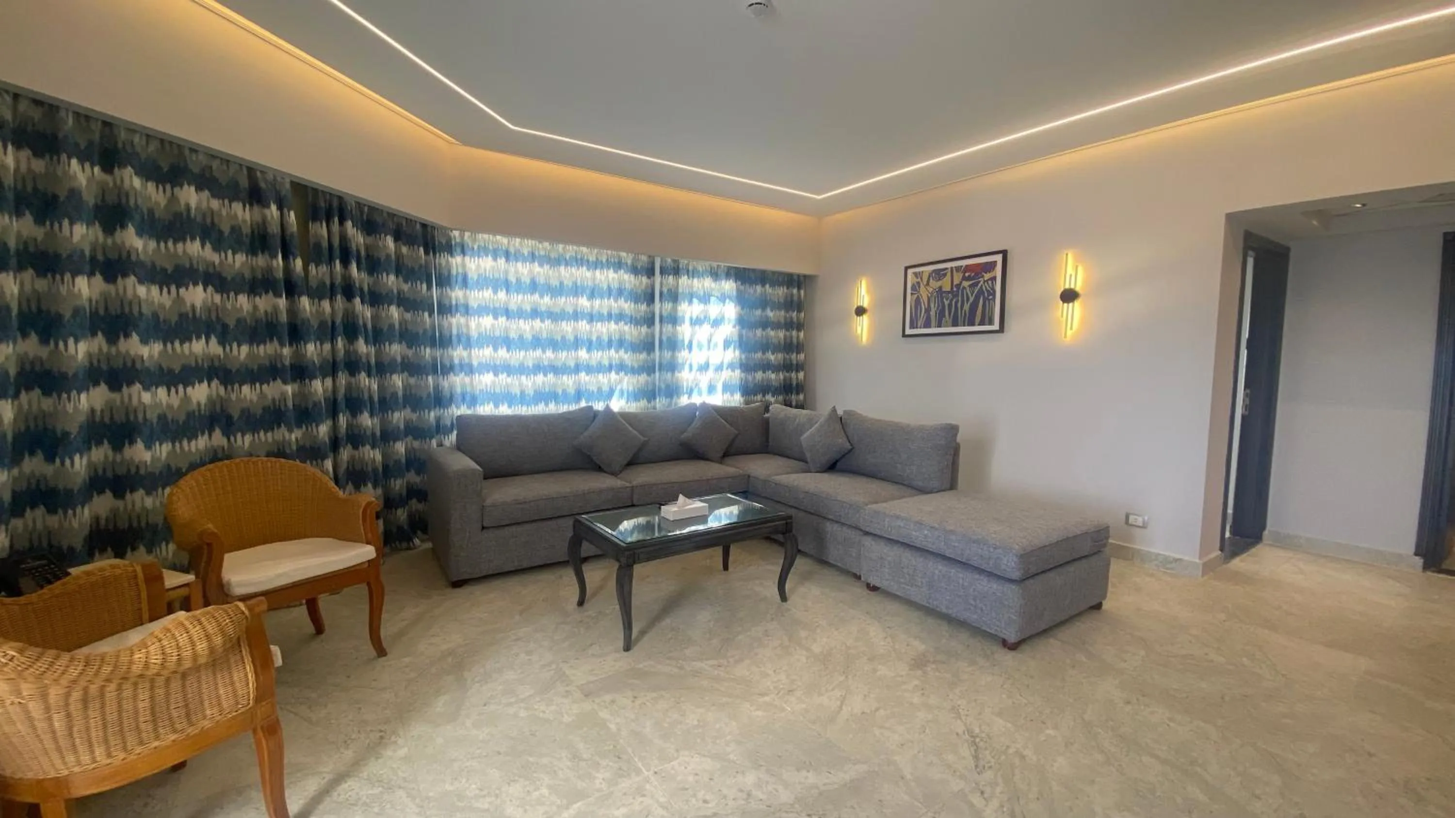 Seating area in Invidia Coral Beach Tiran