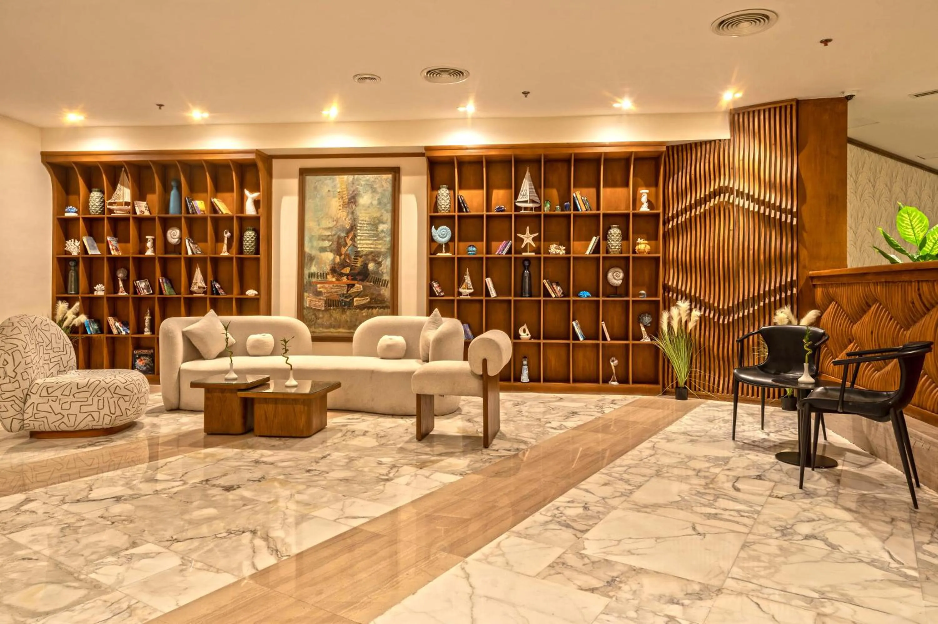 Seating area in Invidia Coral Beach Tiran