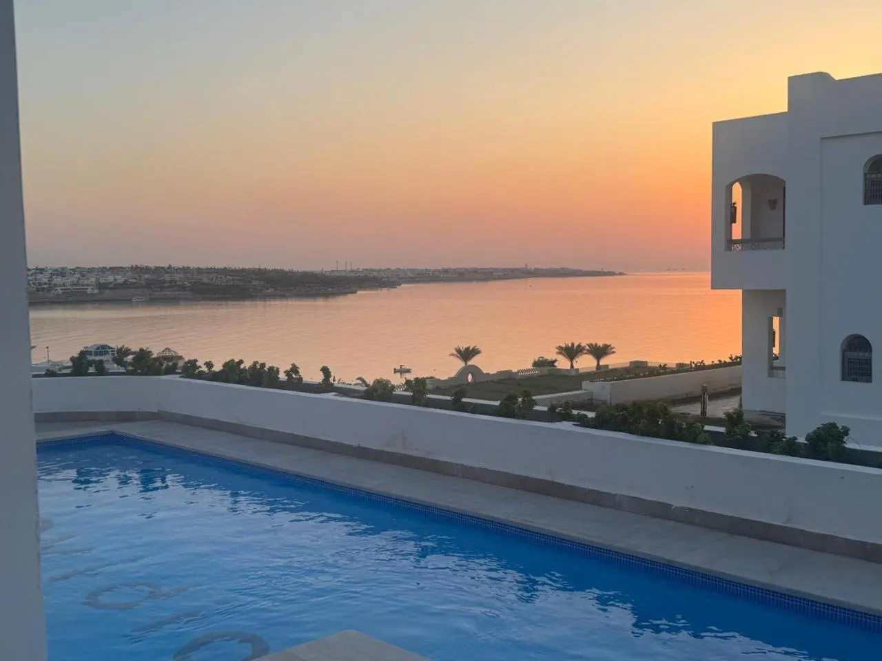 Sunset in Invidia Coral Beach Tiran