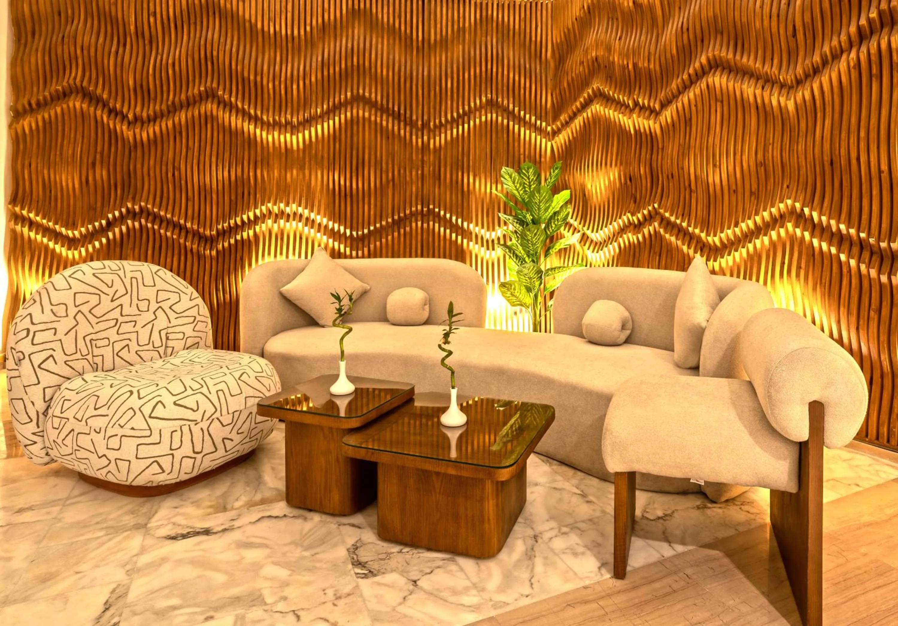 Seating area in Invidia Coral Beach Tiran