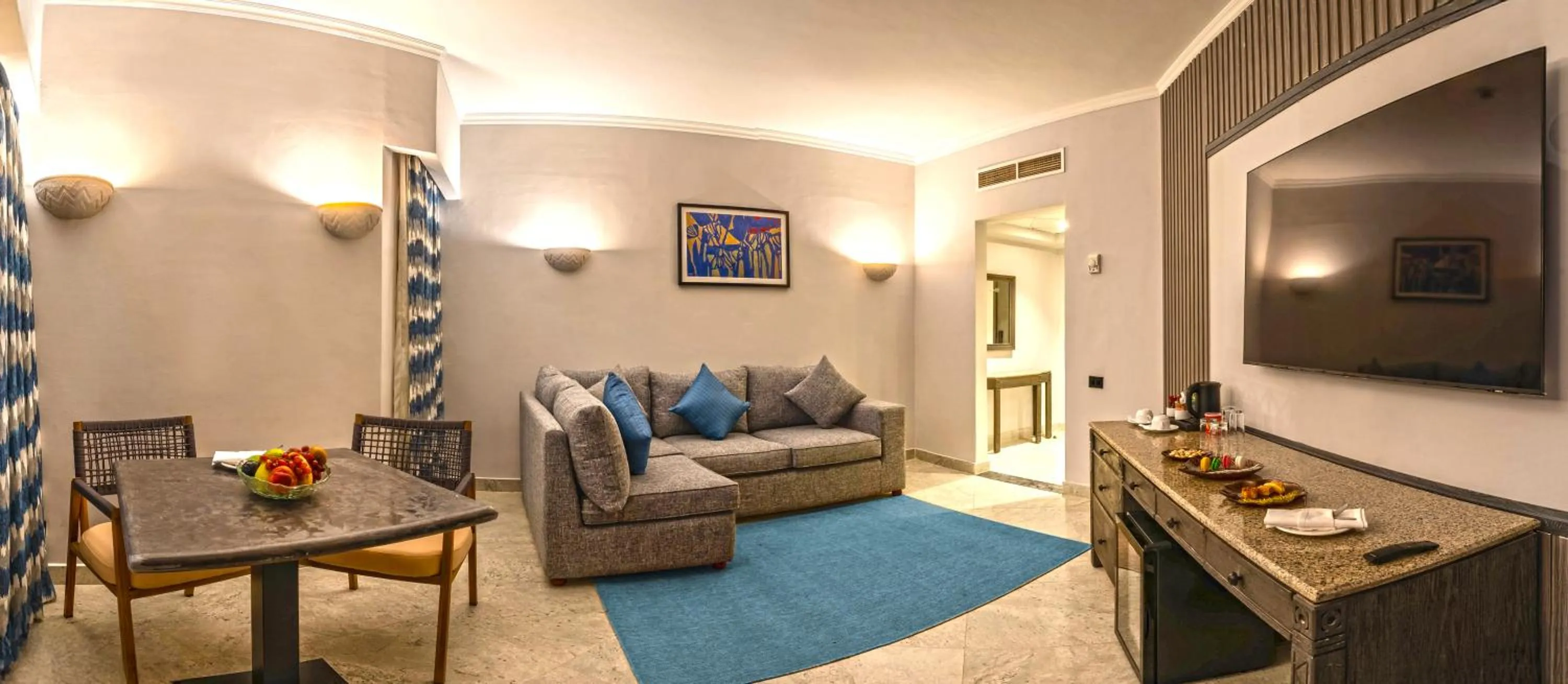 Living room in Invidia Coral Beach Tiran