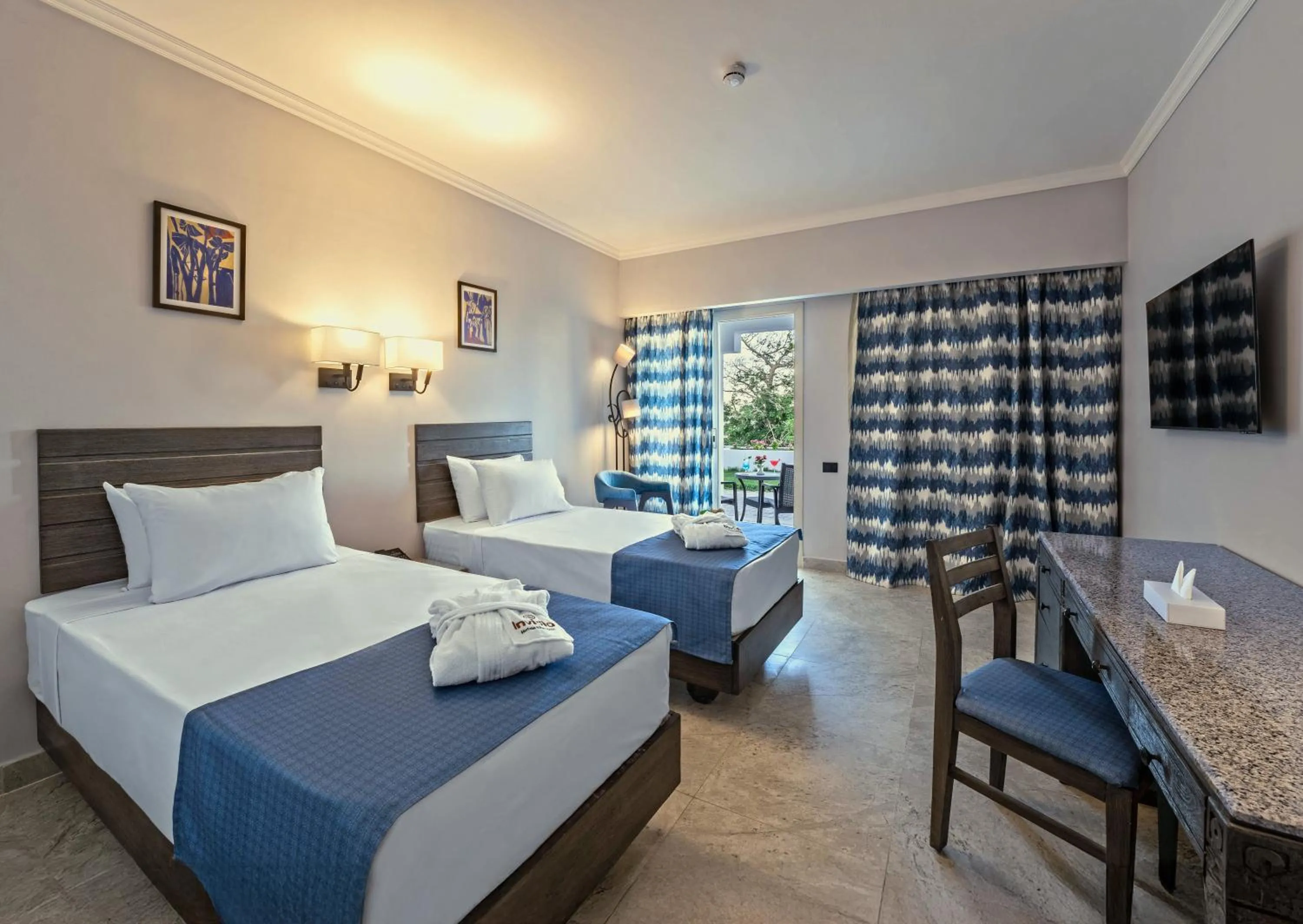 Photo of the whole room, Bed in Invidia Coral Beach Tiran