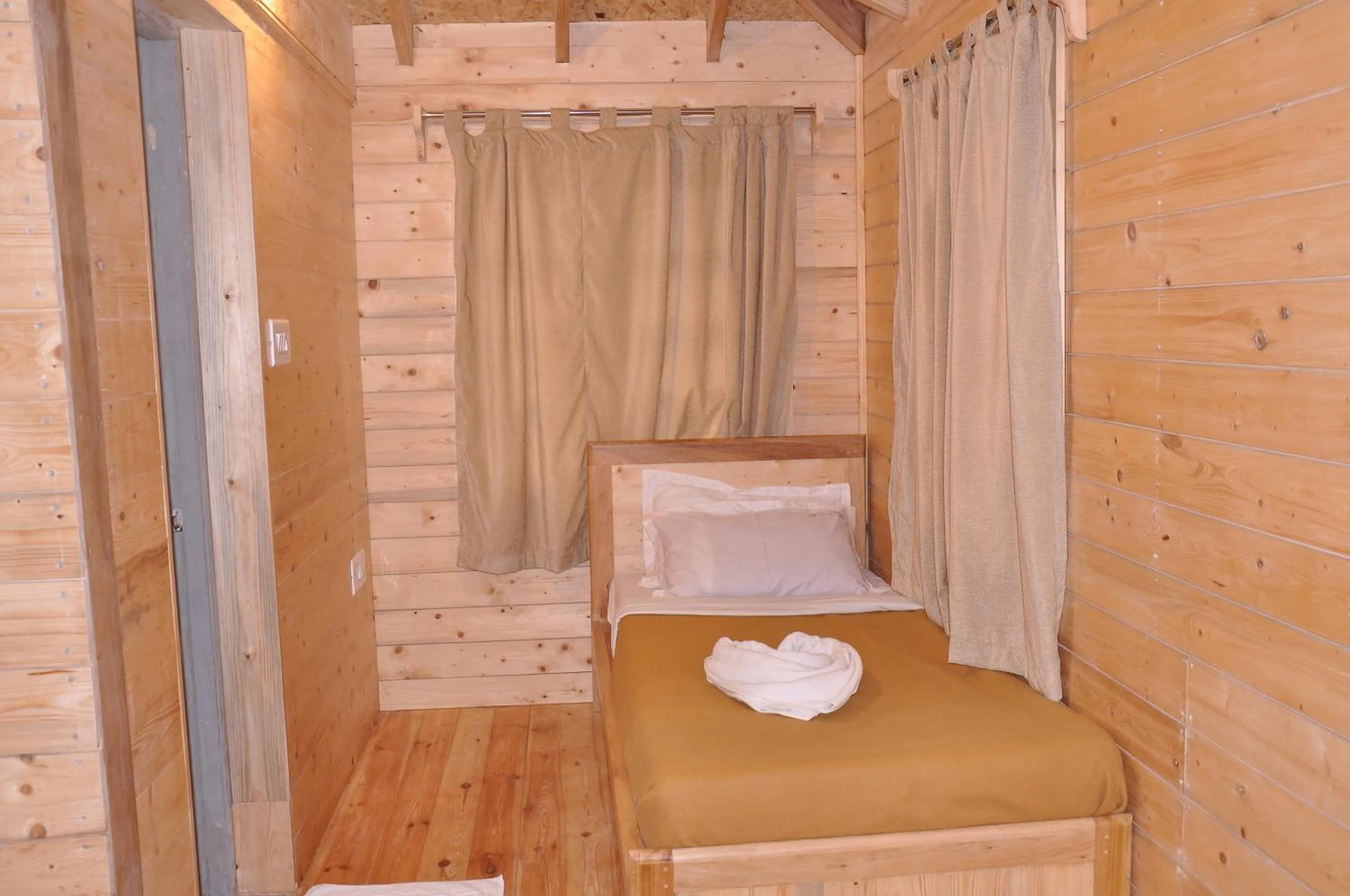 Bed in Lilly's Valley Resort