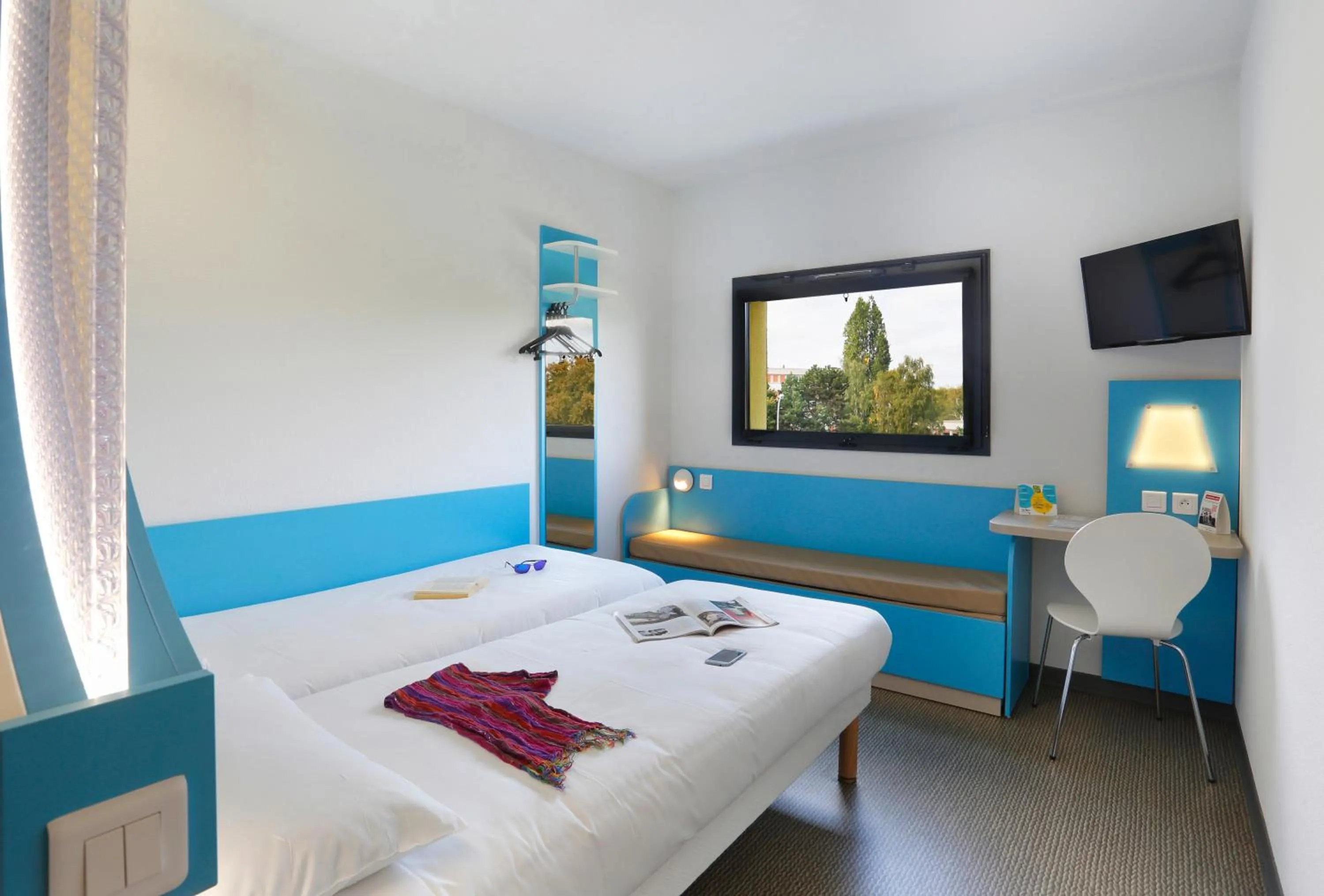 Bed in First Inn Hotel Blois