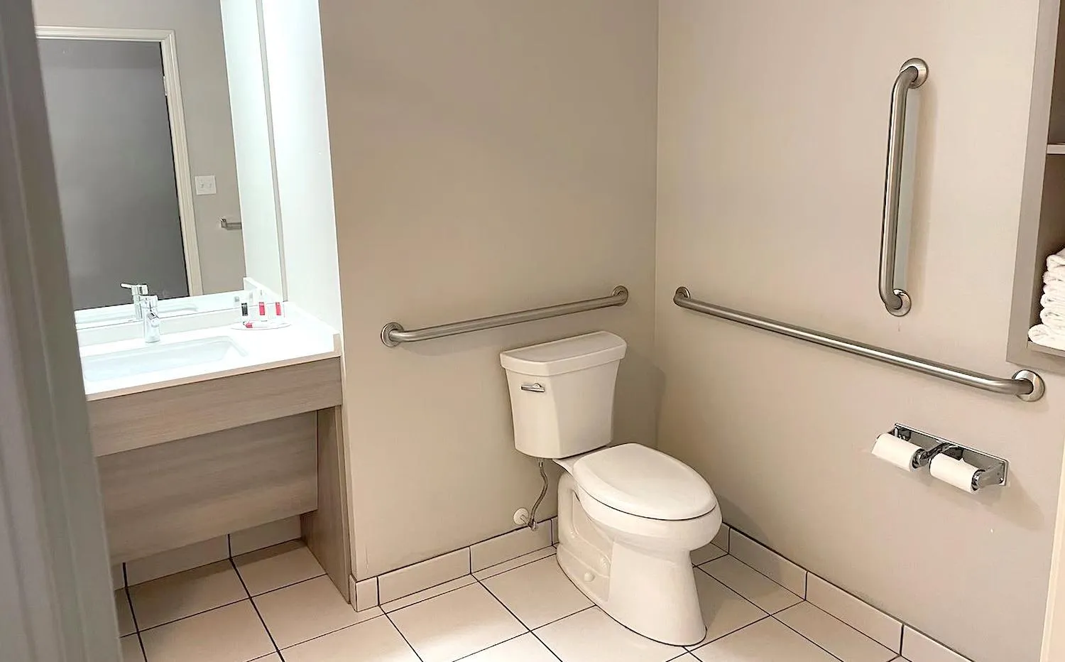 Toilet in Coratel Inn & Suites By Jasper Rochester