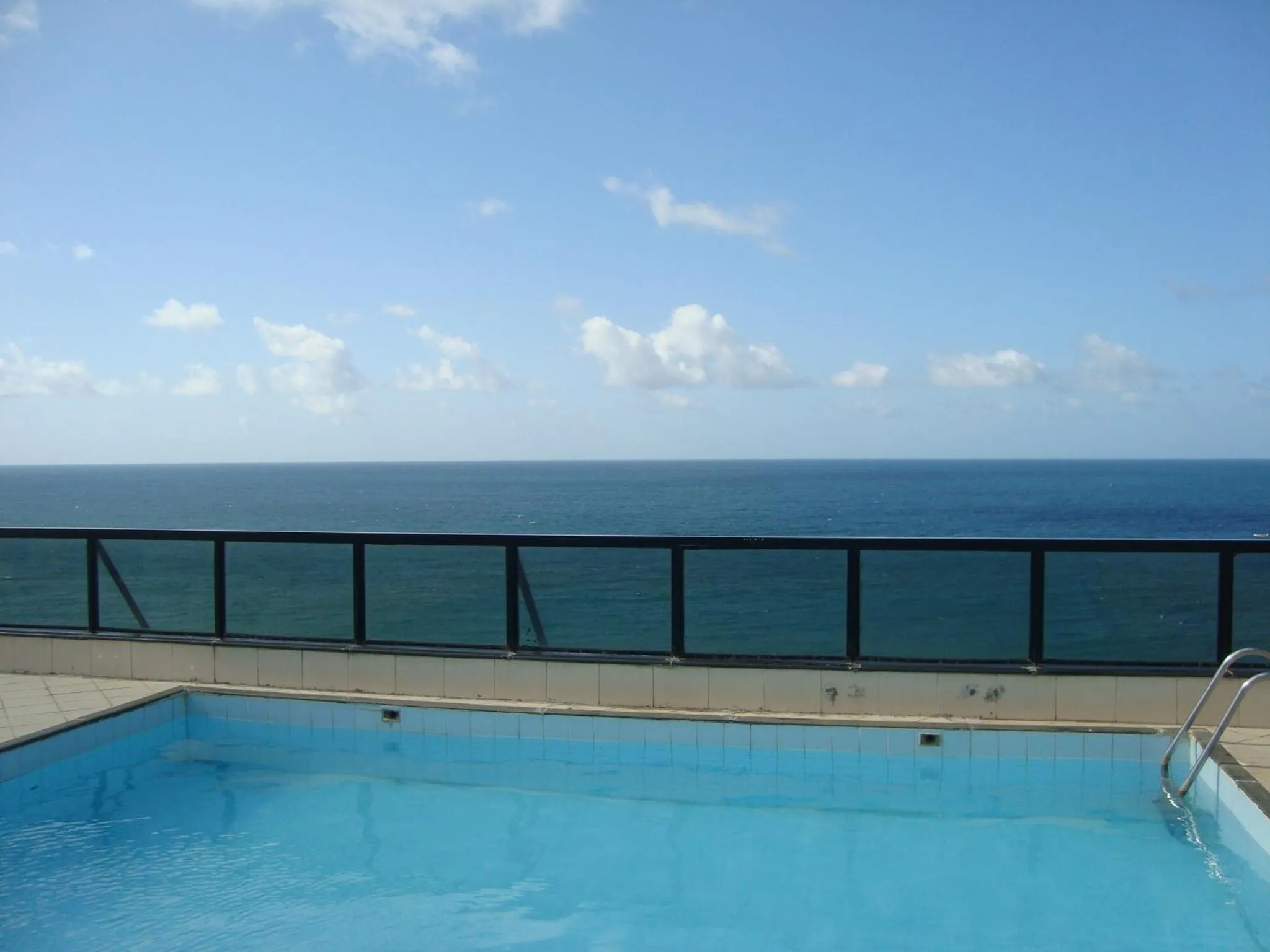 Pool view in Flat na Praia do Farol da Barra