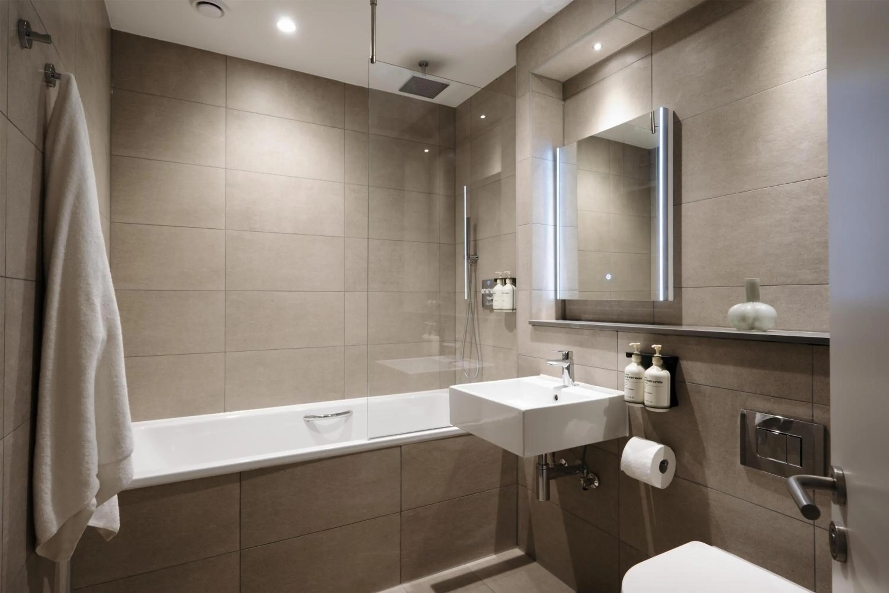 Bathroom in The Hobson Cambridge by Adina