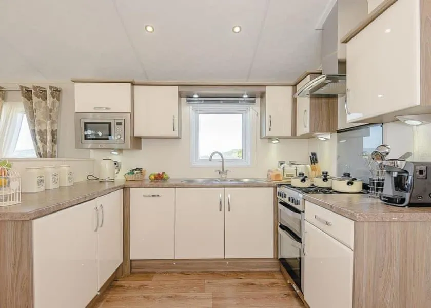 Kitchen or kitchenette in Tan Rallt Holiday Park & Spa