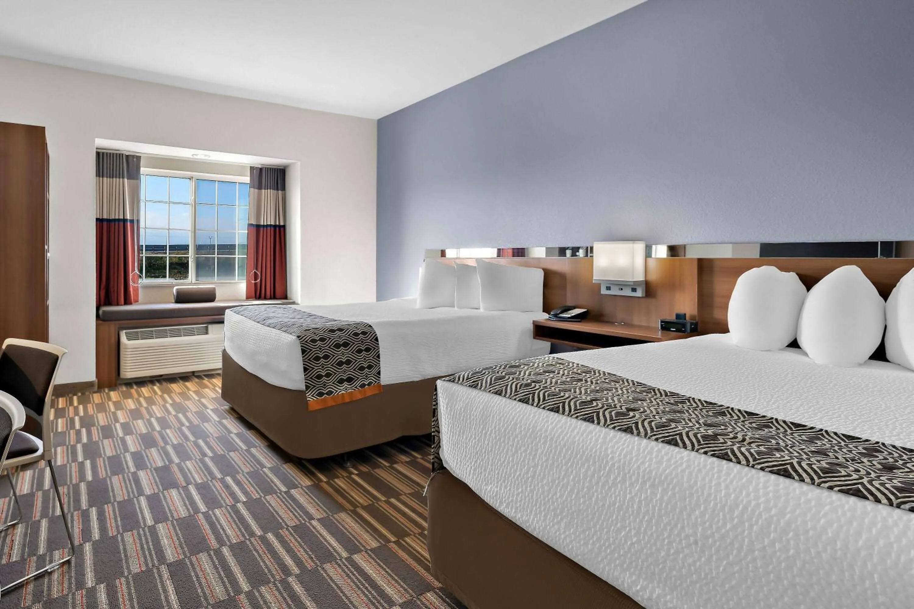 Bed in Microtel Inn & Suites by Wyndham Sweetwater