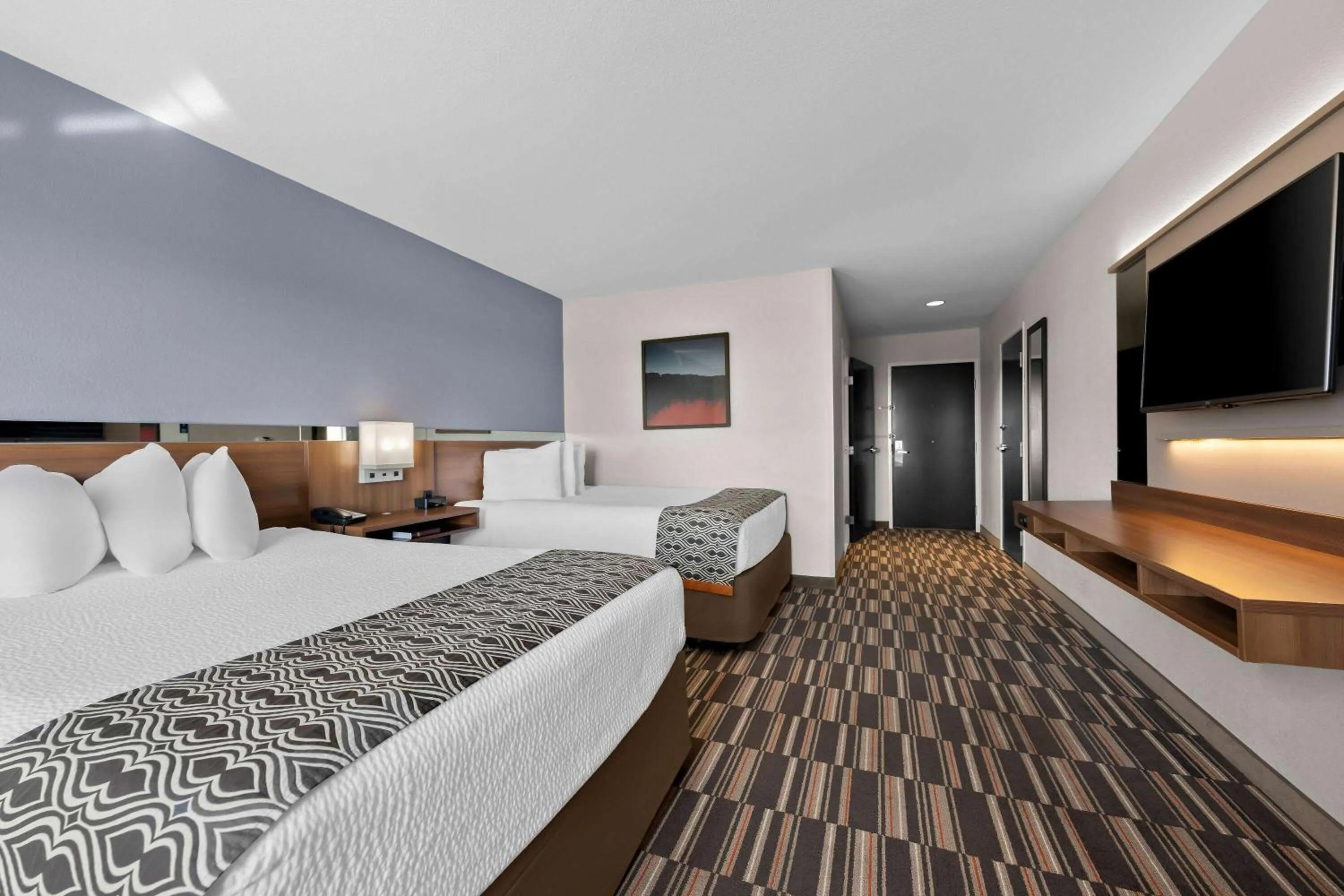 Bed in Microtel Inn & Suites by Wyndham Sweetwater
