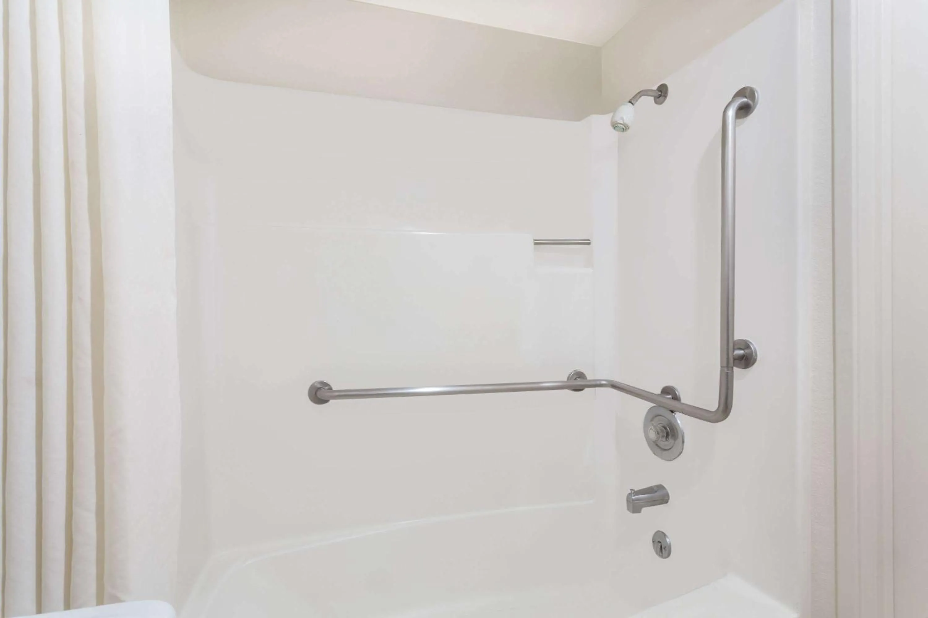 Bathroom in Travelodge by Wyndham Reno