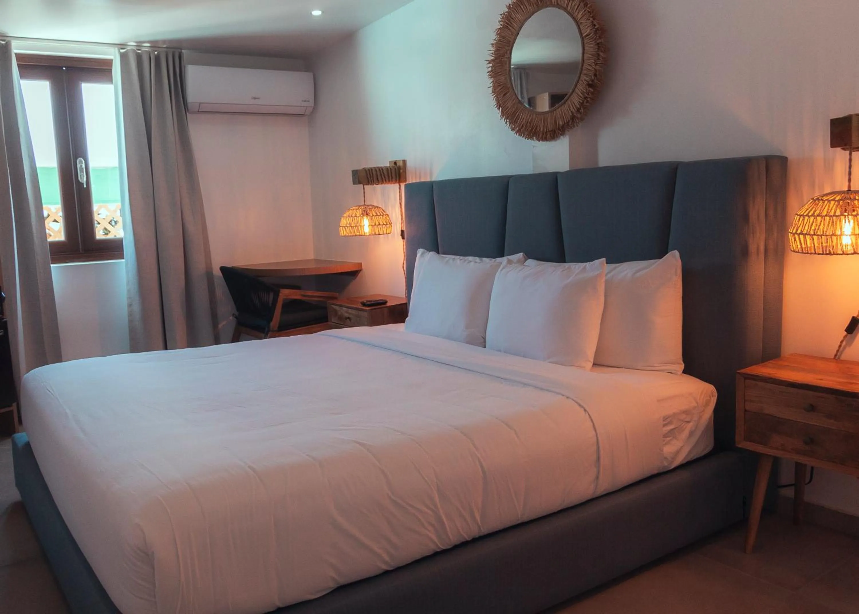 Bedroom, Bed in Parguera Plaza Hotel - Adults Only