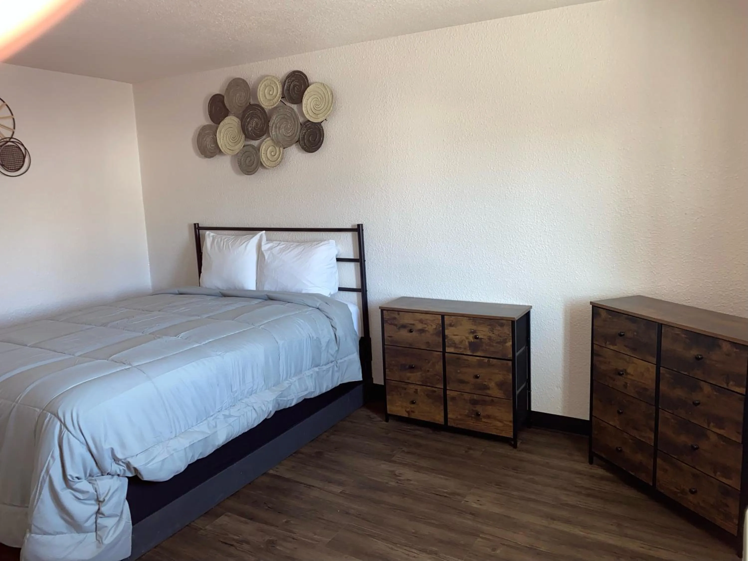 Bed in Baker City Motel & RV