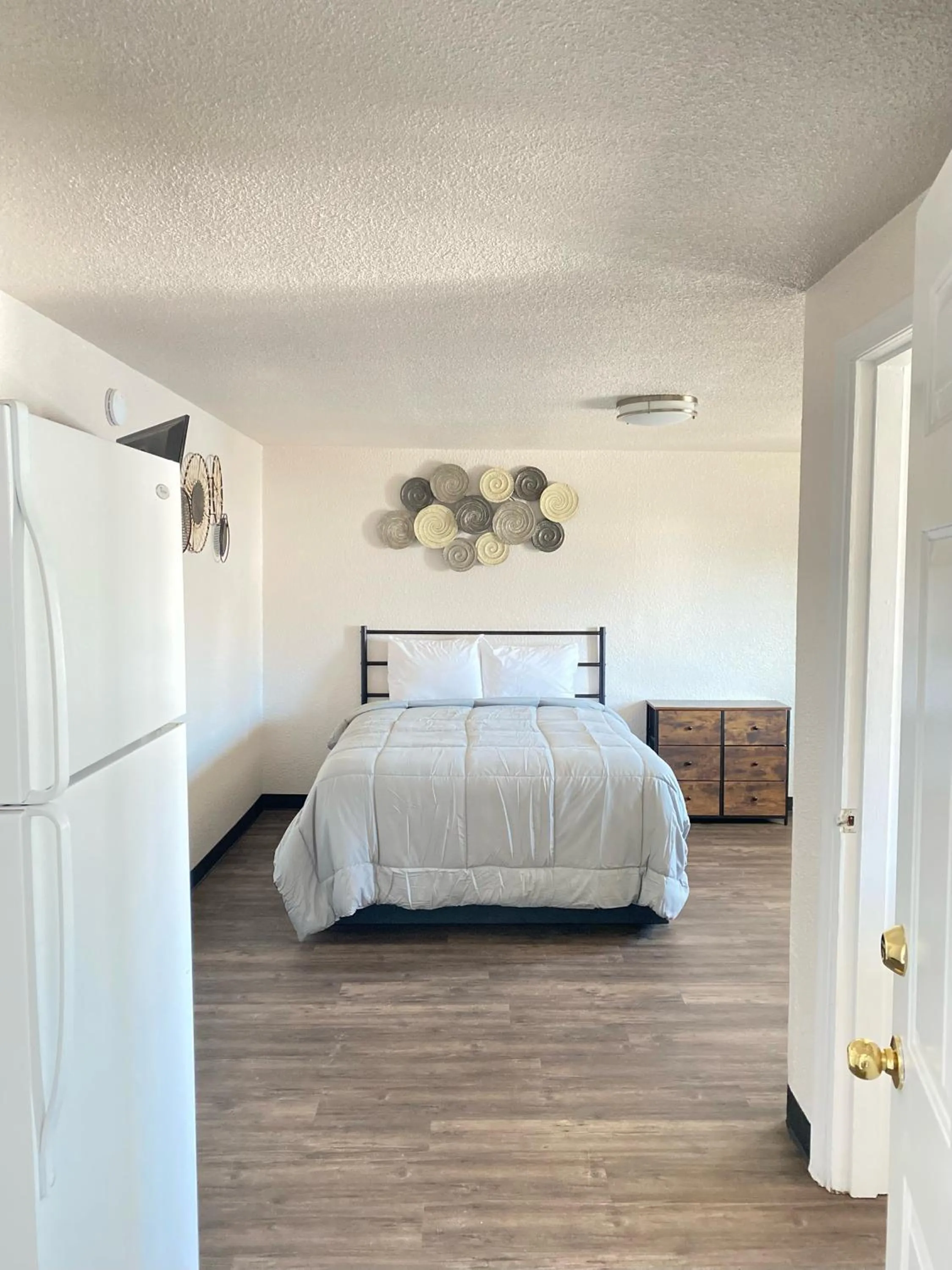 Bed in Baker City Motel & RV