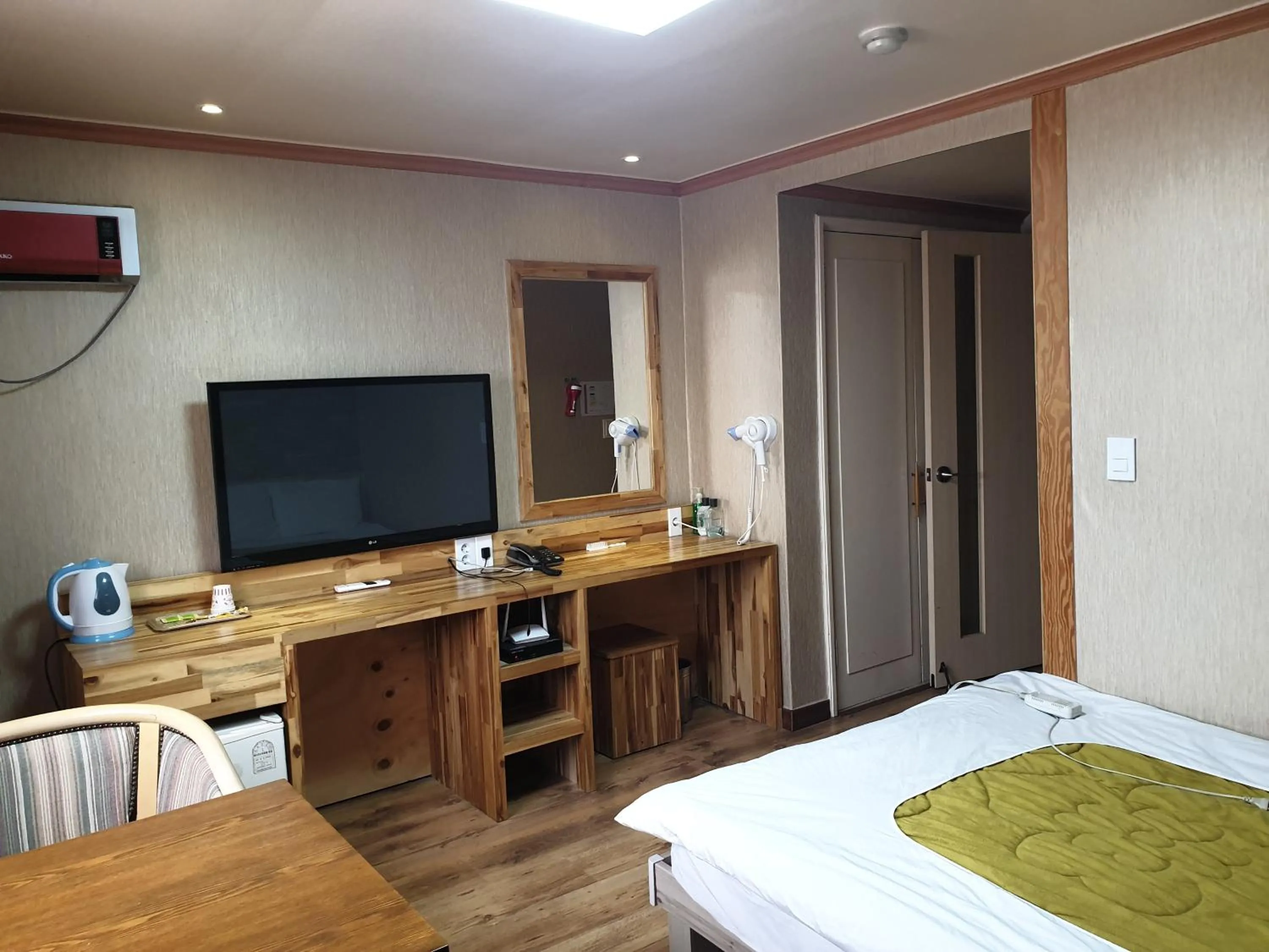 Bed in Green and Blue Hotel