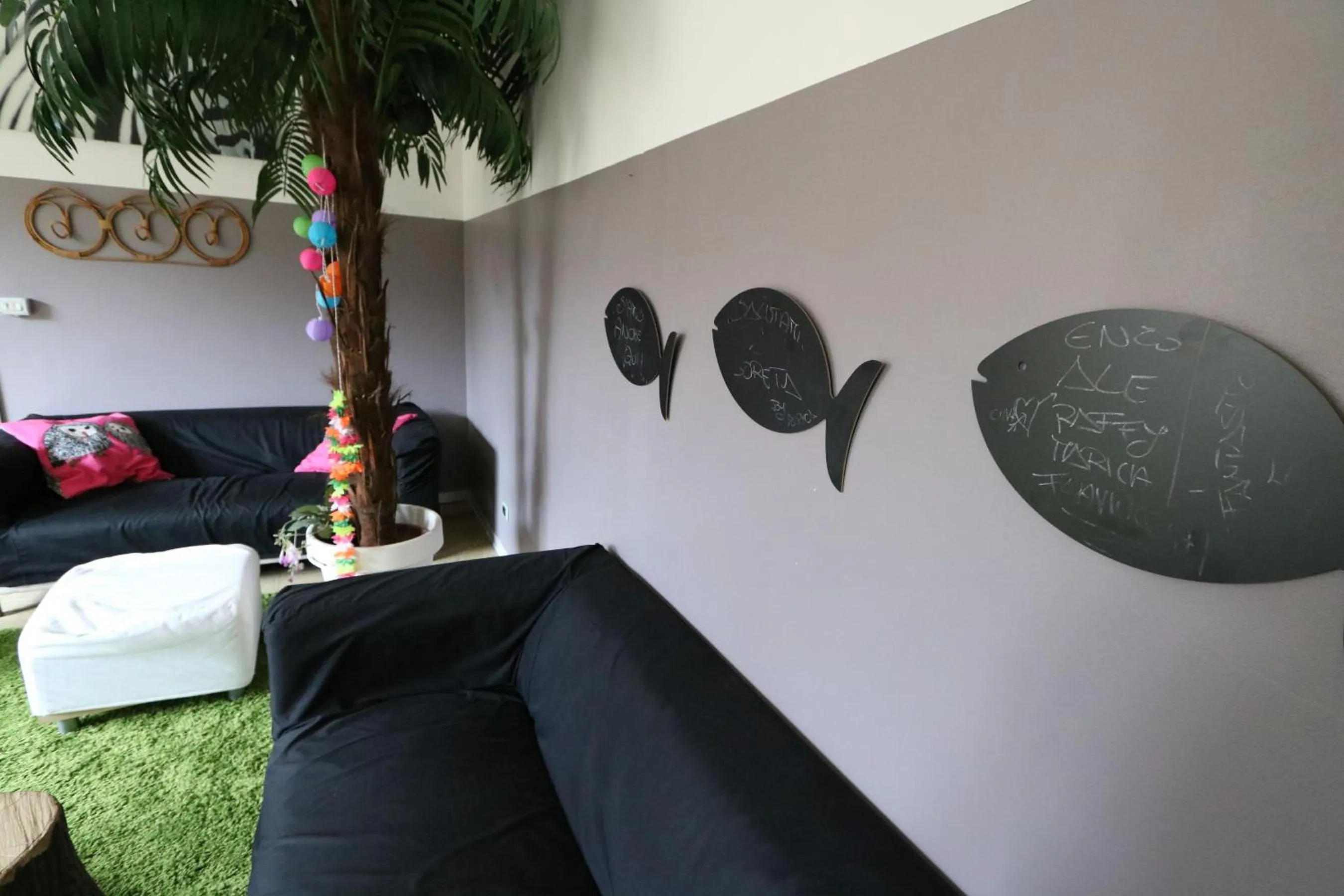 Communal lounge/ TV room in Panda Hostel