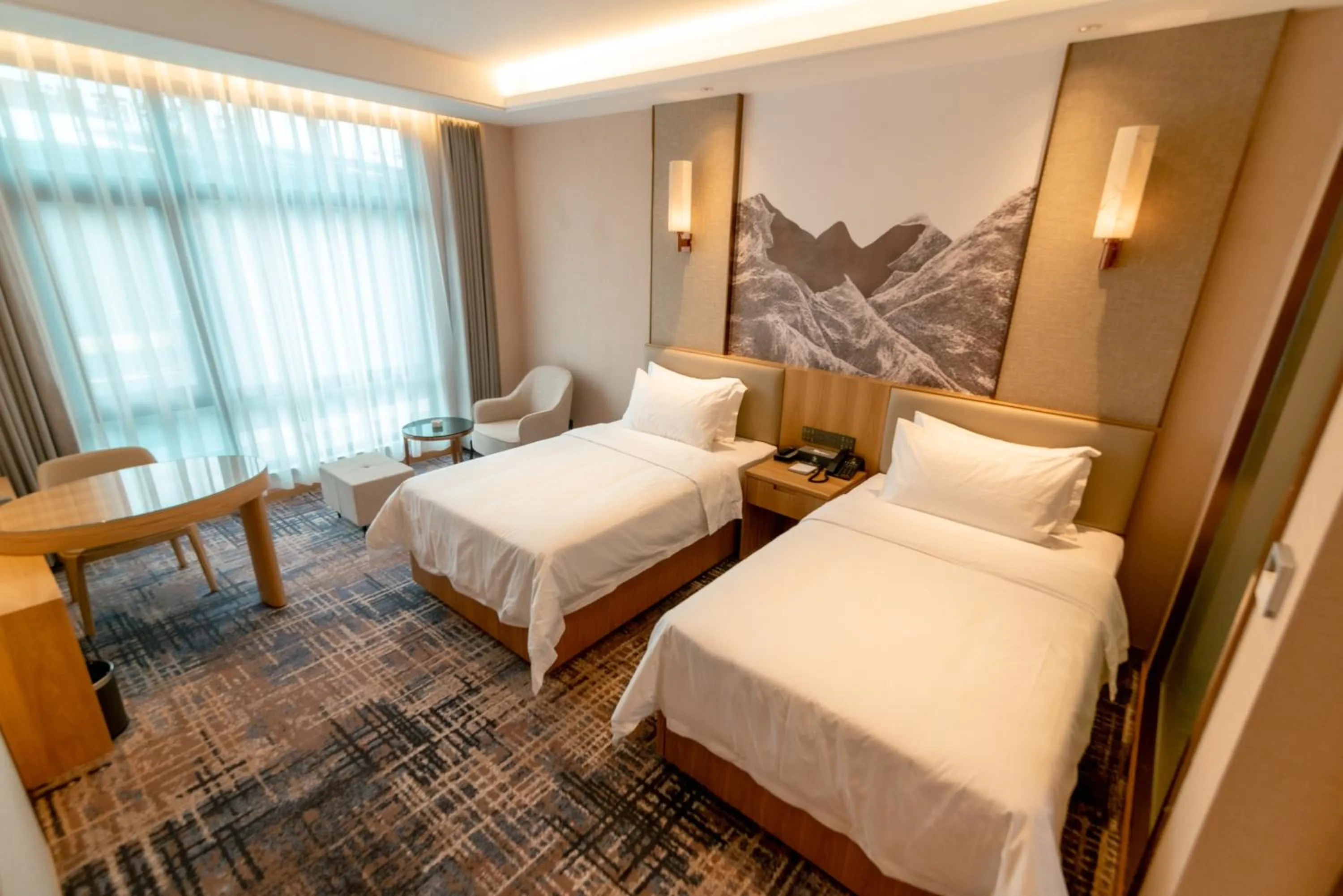 Bed in ShengDa International Hotel