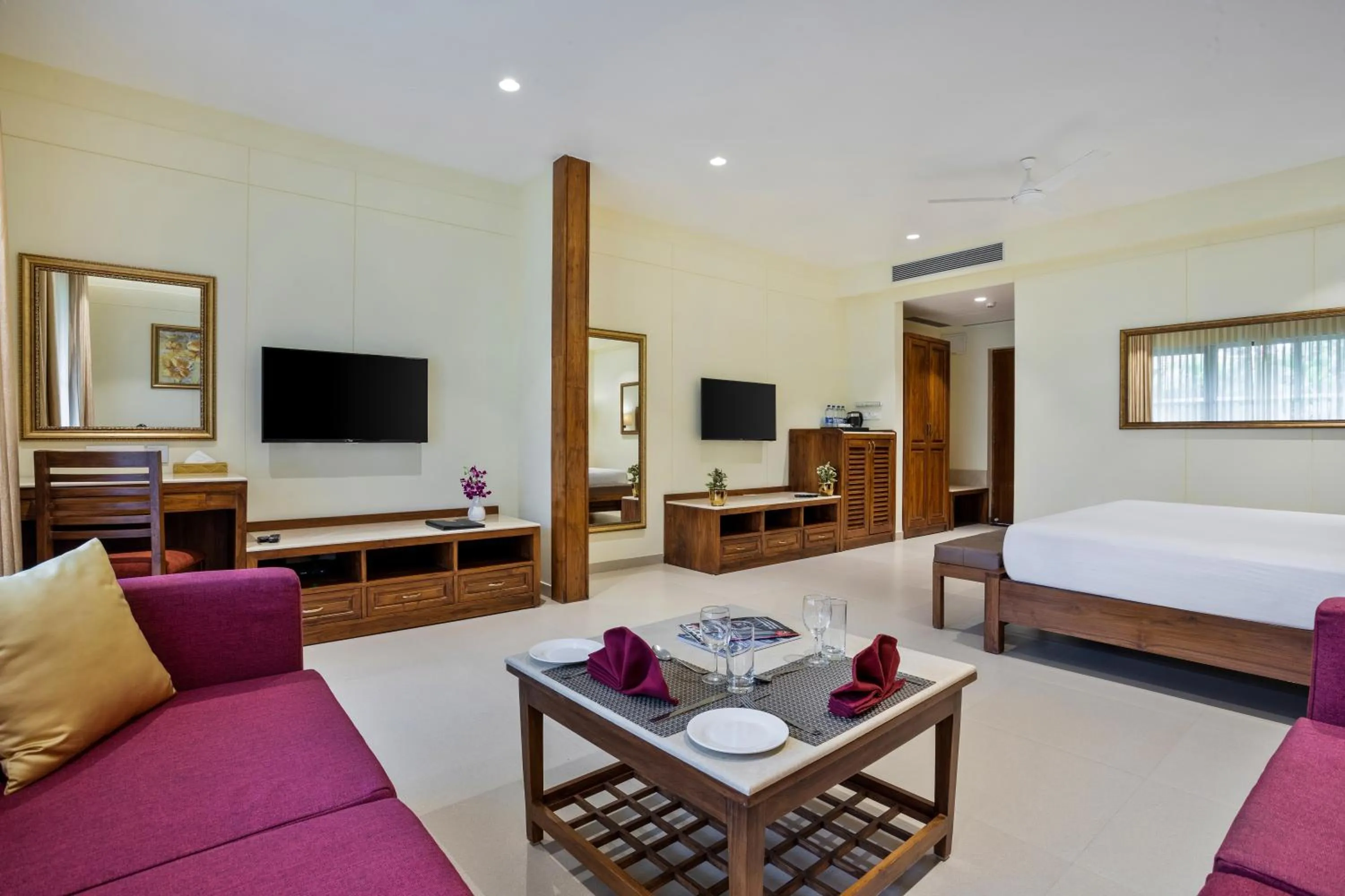 Living room, Bed in Seashell Suites and Villas- Candolim Goa