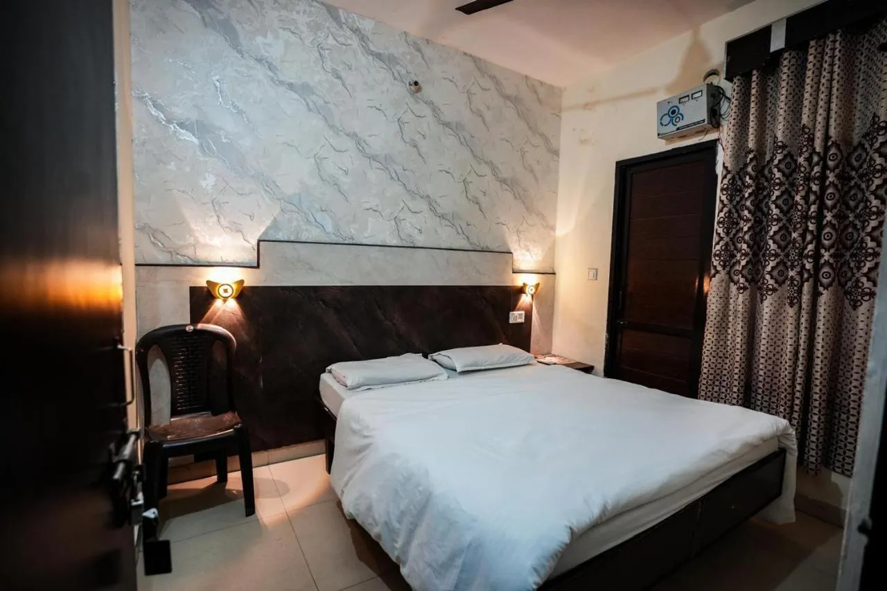 Bed in Hotel Blessing Inn