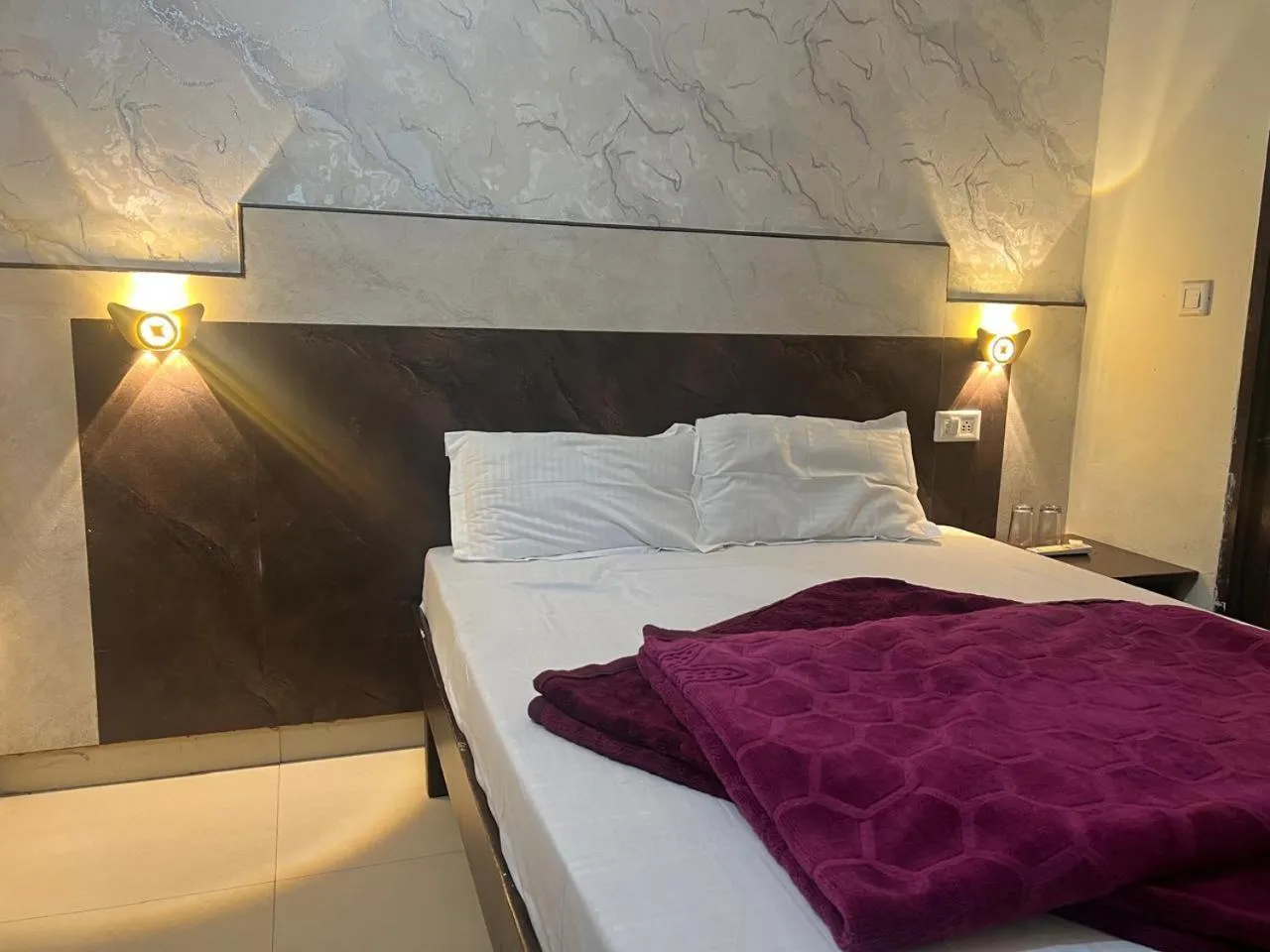 Bed in Hotel Blessing Inn