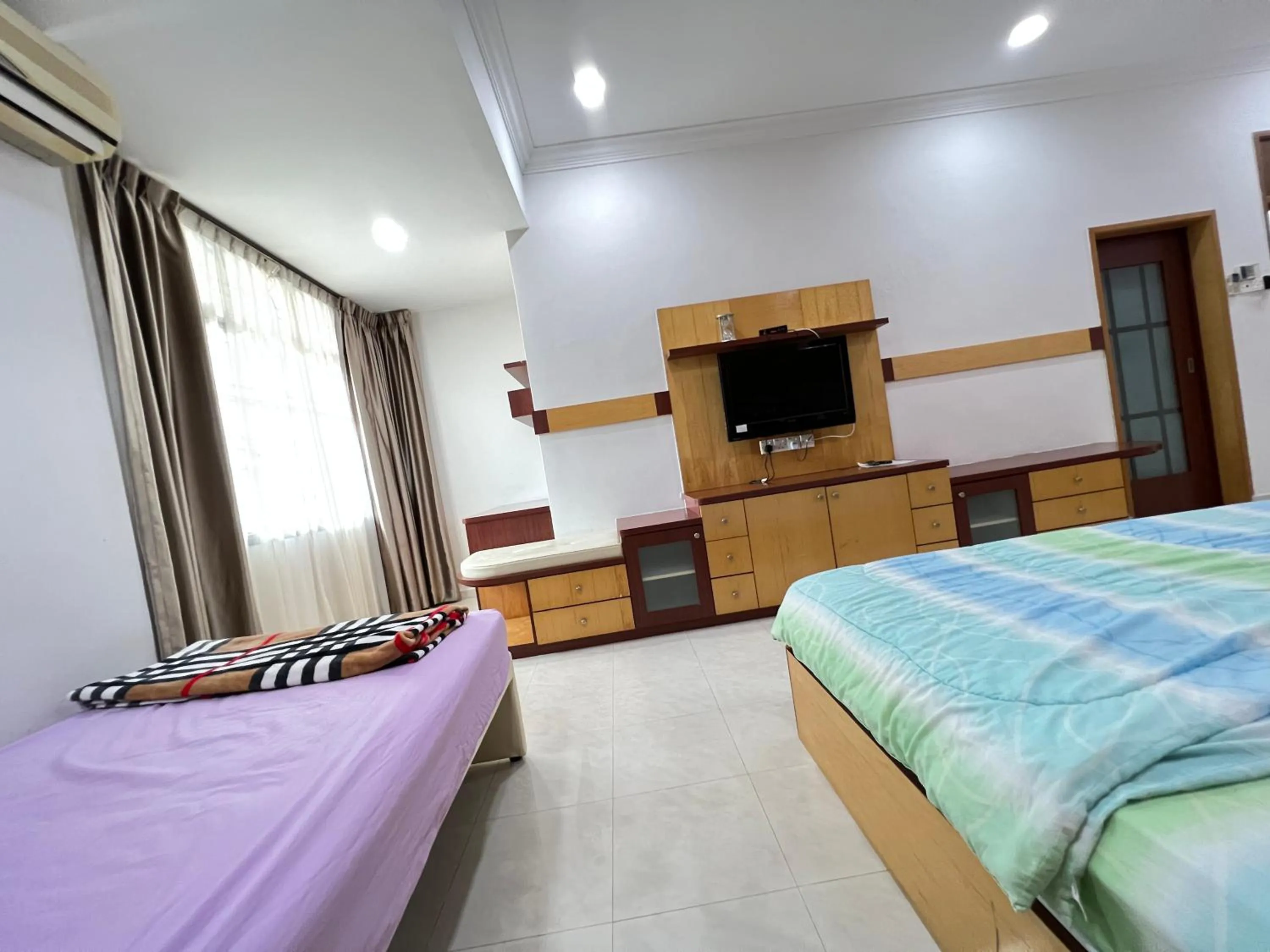 Bed in Jiaxin Homestay - Desa Terbau 家馨民宿