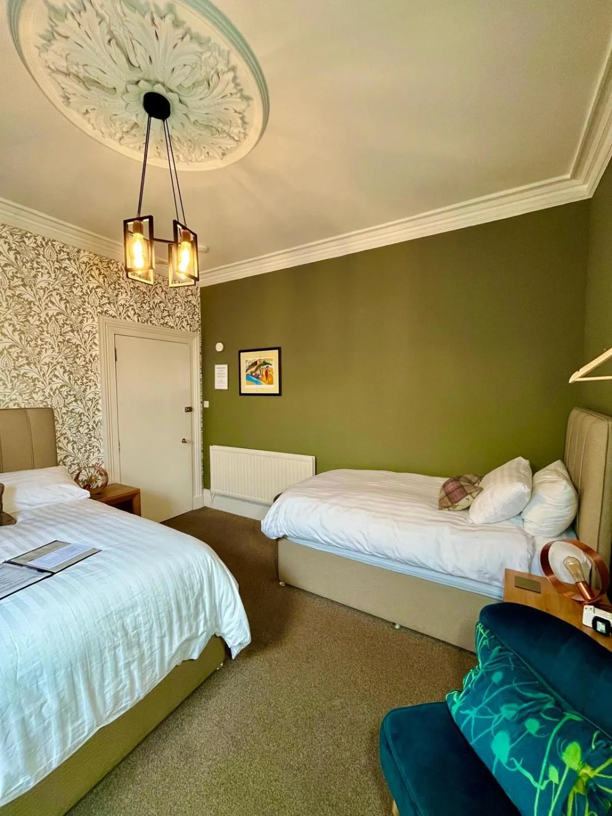 Bed in Ravenswood Guest House