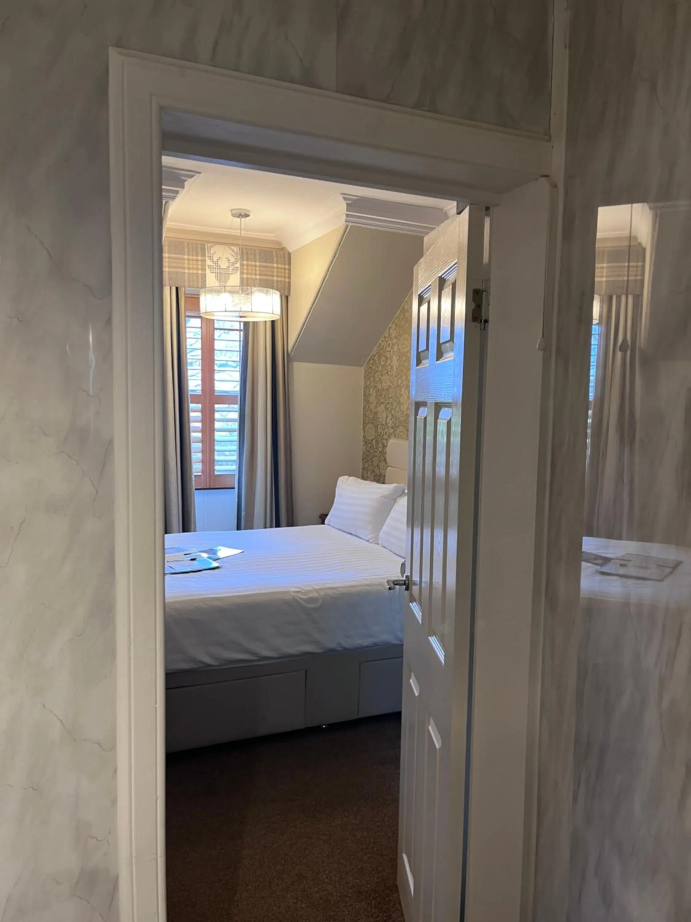 Bed in Ravenswood Guest House