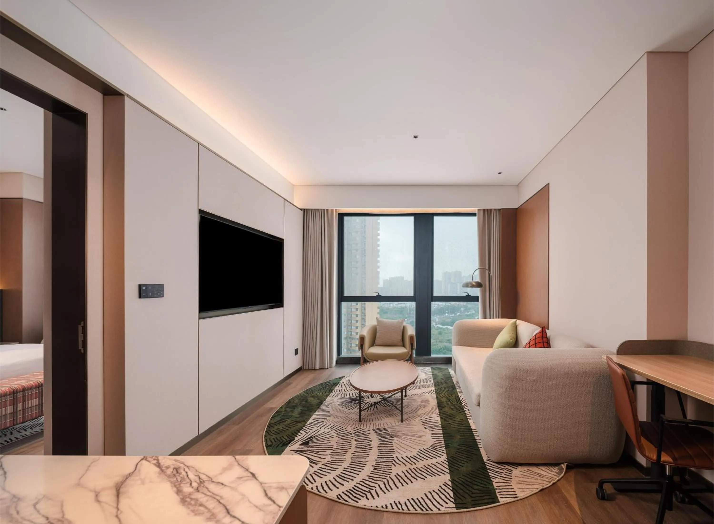 Living room, Bed in Hilton Garden Inn Chengdu East Railway Station