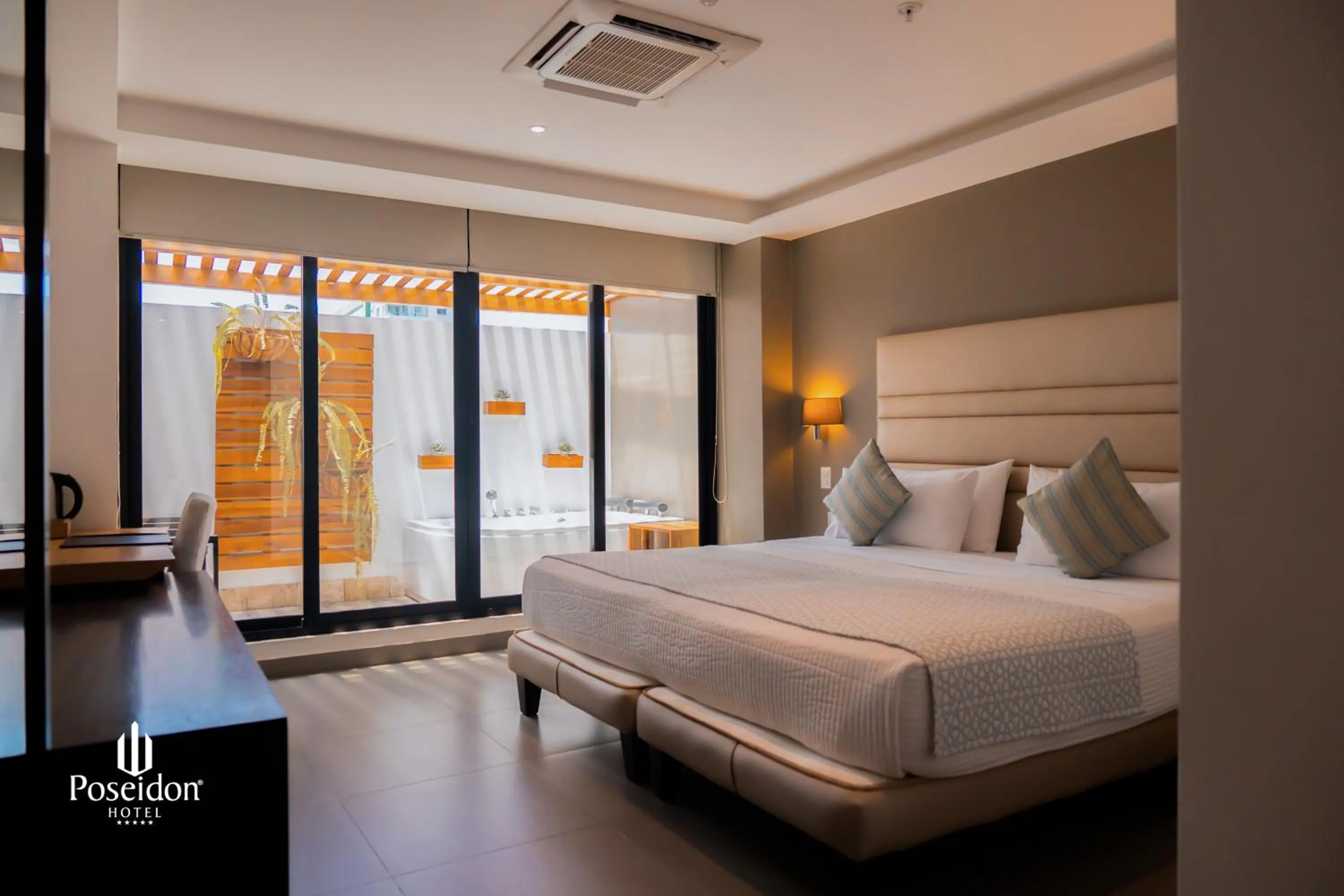 Bed in Hotel Poseidon