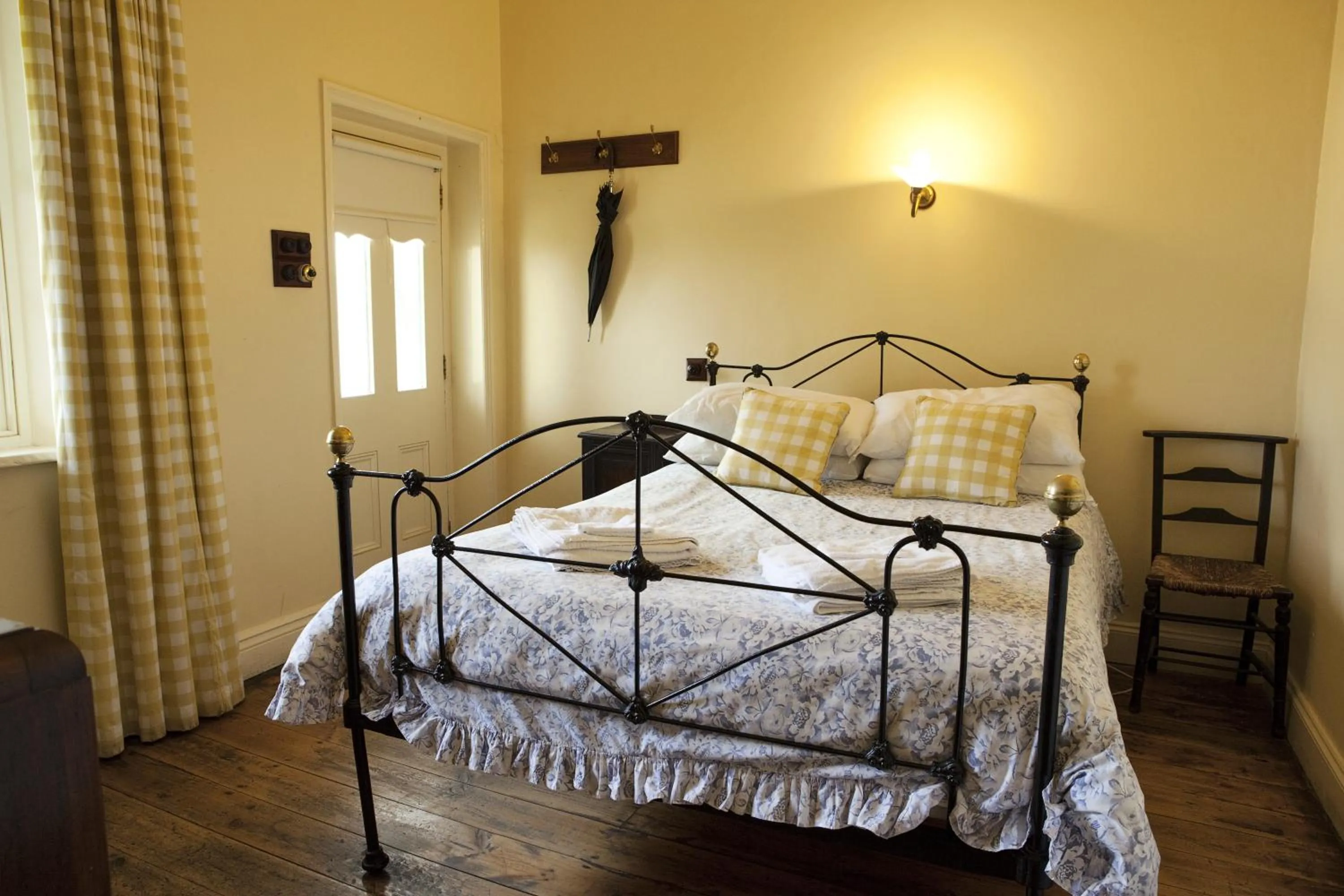 Bedroom in The Rising Sun Hotel